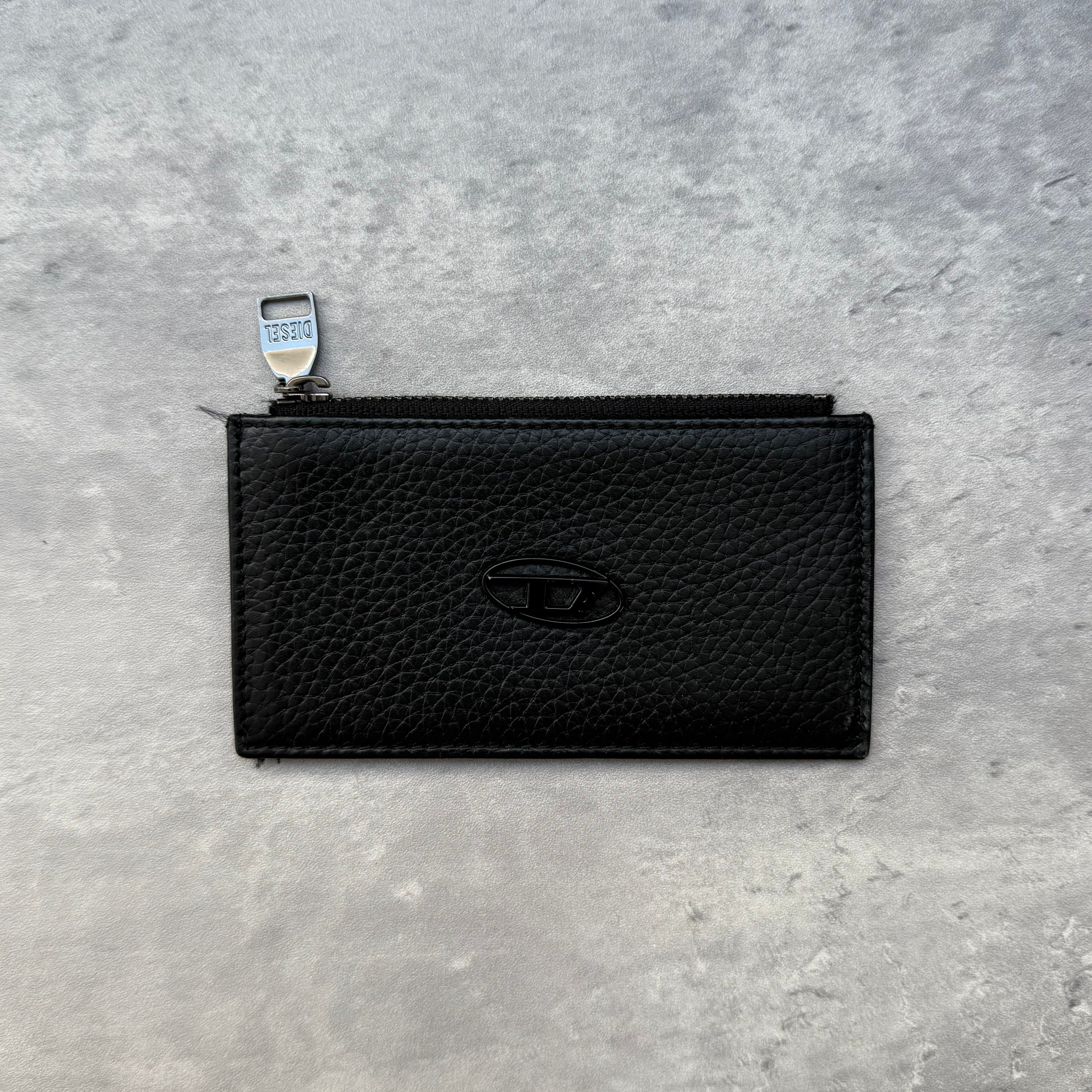 Diesel Hissu Evo Cardholder III in black textured leather with multiple card slots and zip compartment, slim compact design.