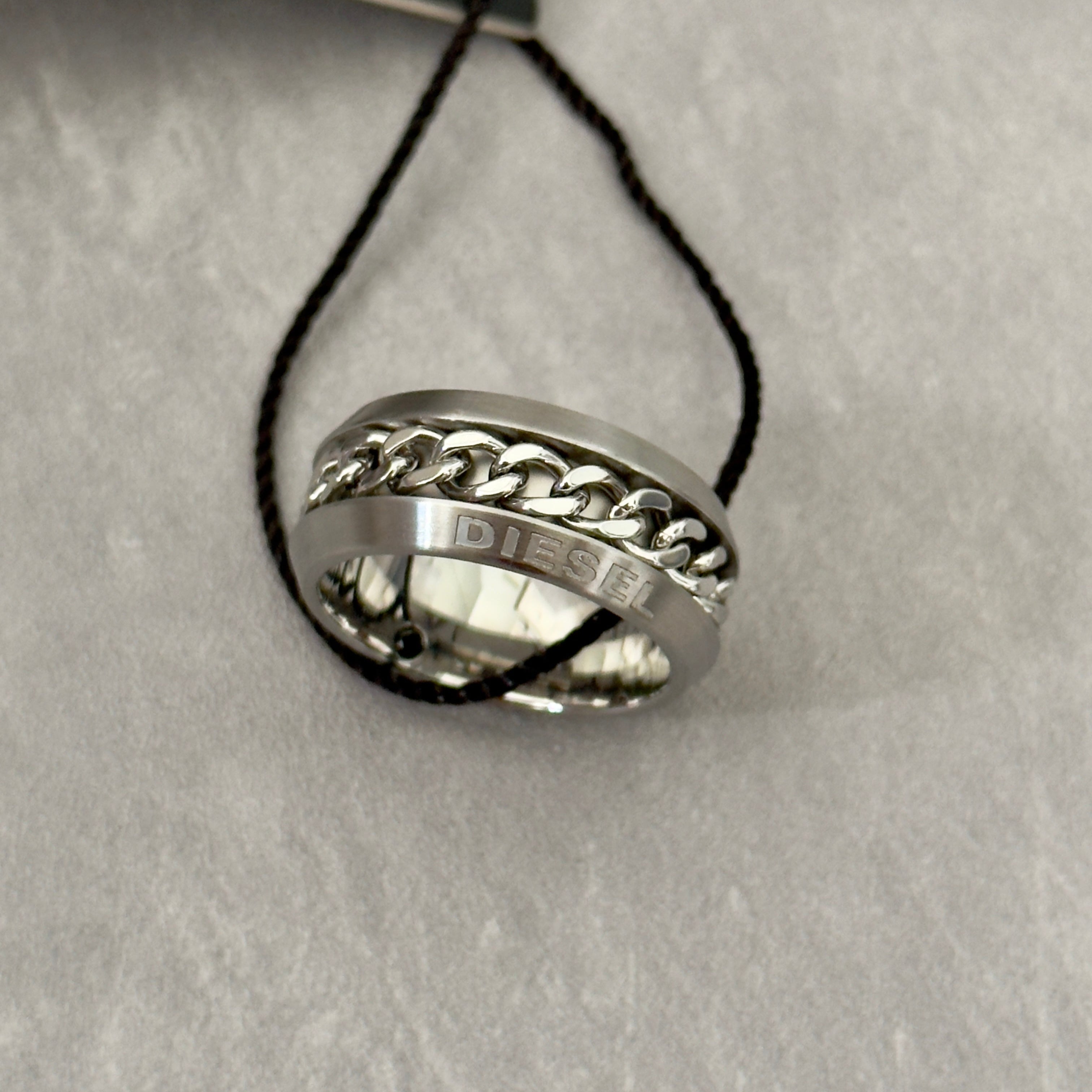 Diesel Stainless Steel Chain Inlay Ring with engraved Diesel logo and a bold chain-link detail.