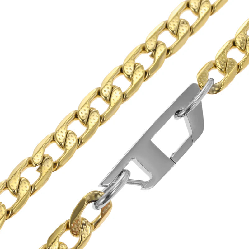 Gold-tone stainless steel Diesel DX1438931 Cuban link necklace featuring a silver-tone Diesel “D” clasp.