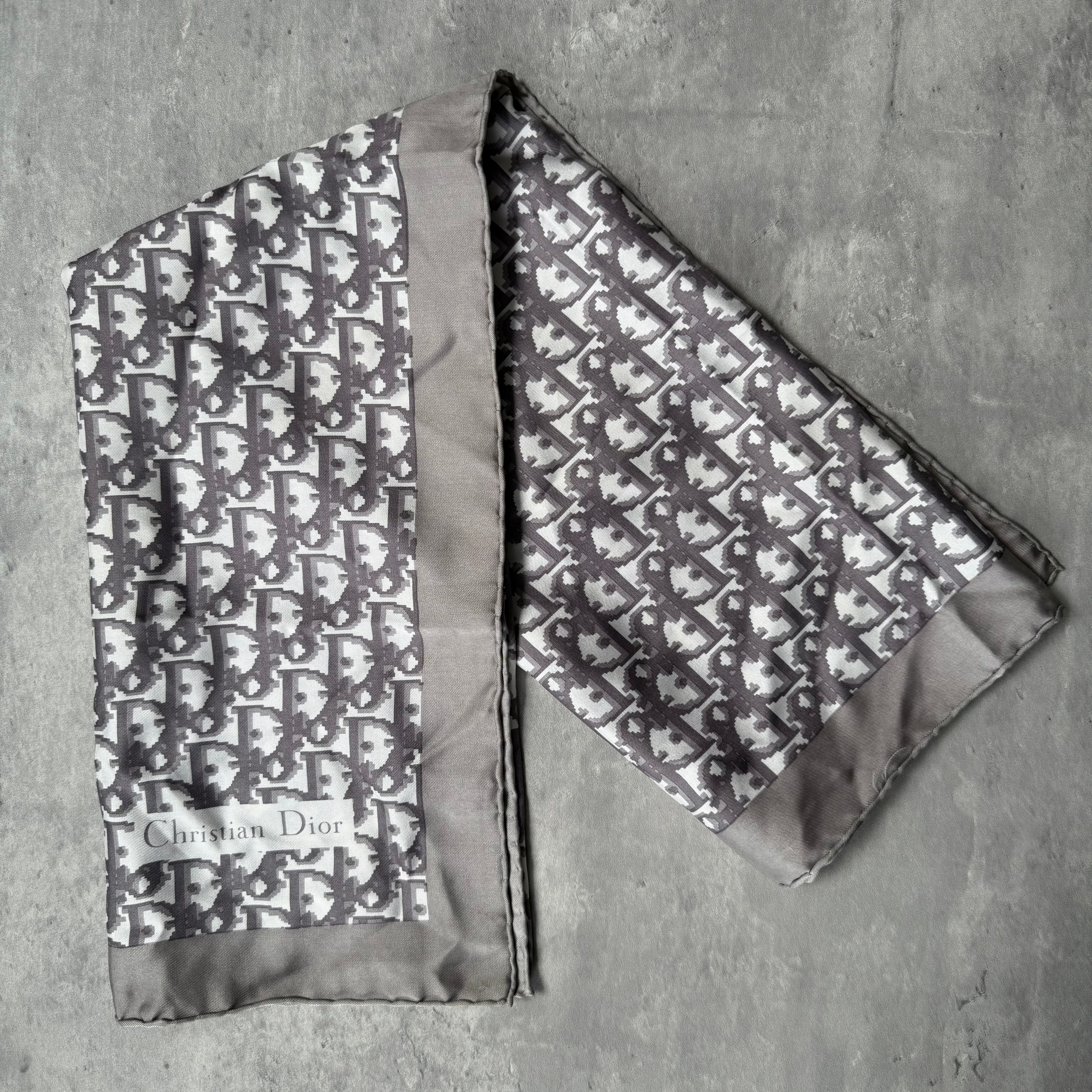 Dior Monogram Silk Scarf in grey with white Oblique pattern, hand-rolled edges, and Dior logo tag.
