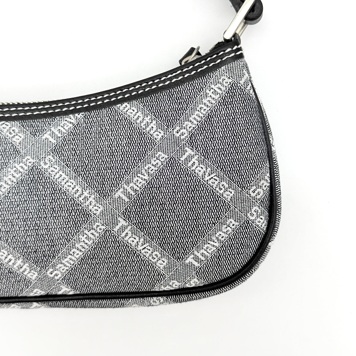 Samantha Thavasa Monogram Baguette Shoulder Bag in grey and black with all-over logo print and black strap.