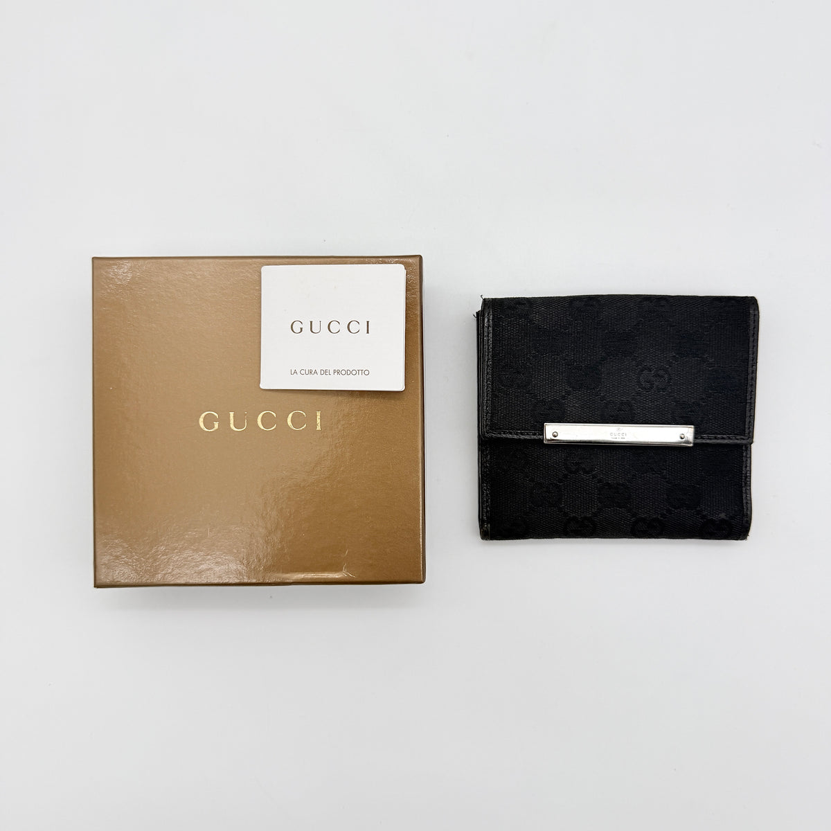 Gucci black GG Monogram French Flap Wallet with silver-tone bar hardware and original box.