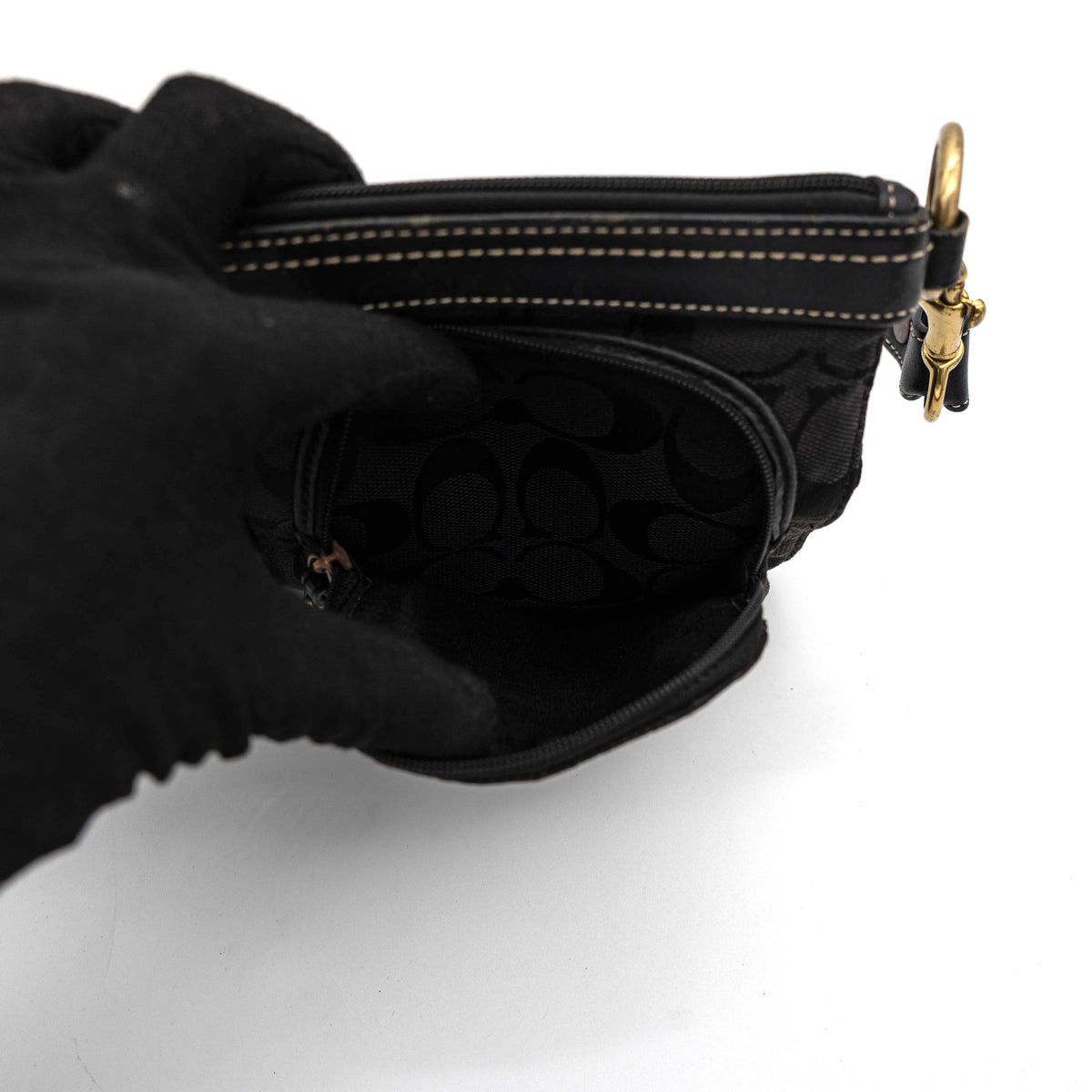 Coach Signature Double Pocket Shoulder Bag in black jacquard with dual zip pockets and an adjustable leather strap.