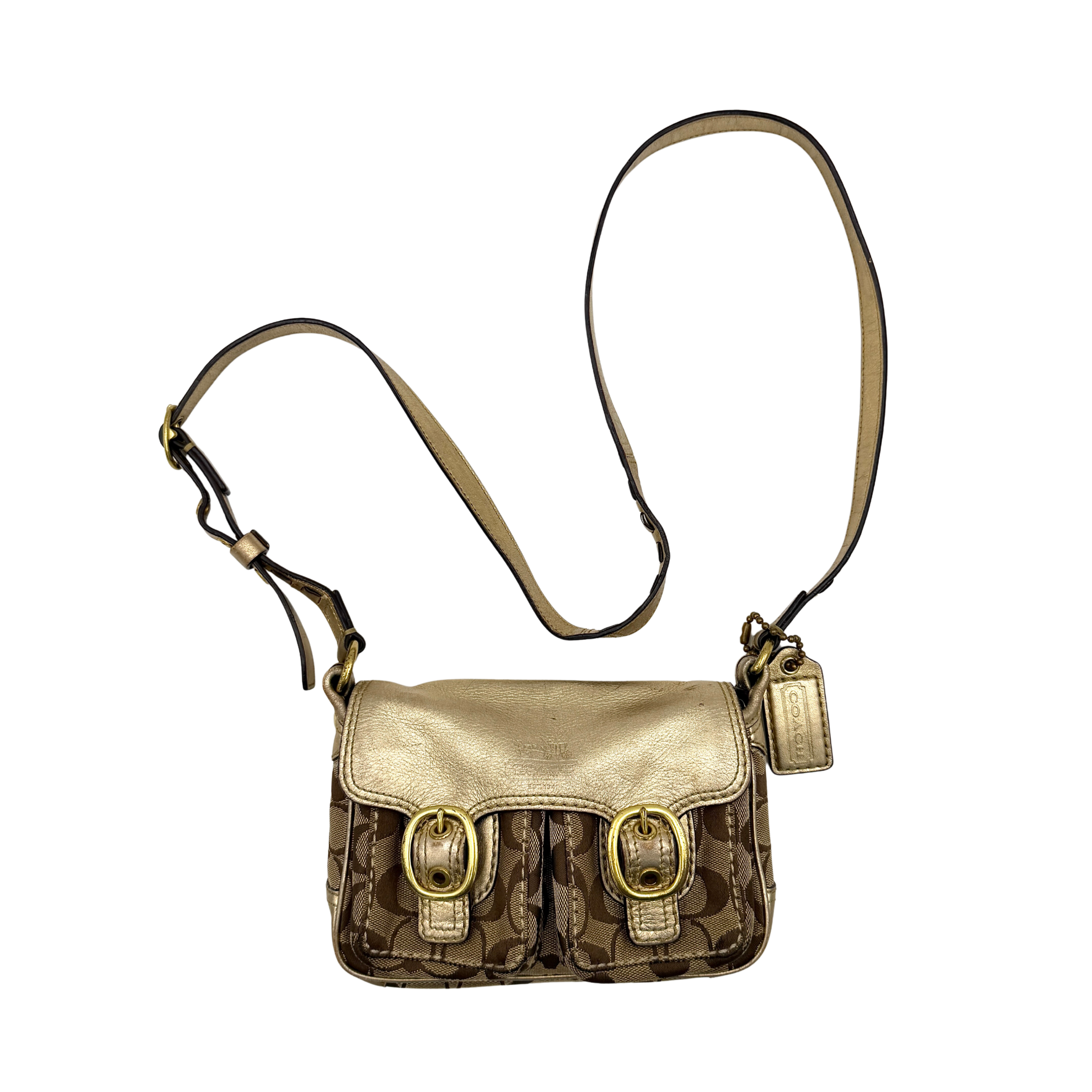 Coach Bleecker crossbody bag in gold metallic leather and beige monogram canvas with double front buckle details.