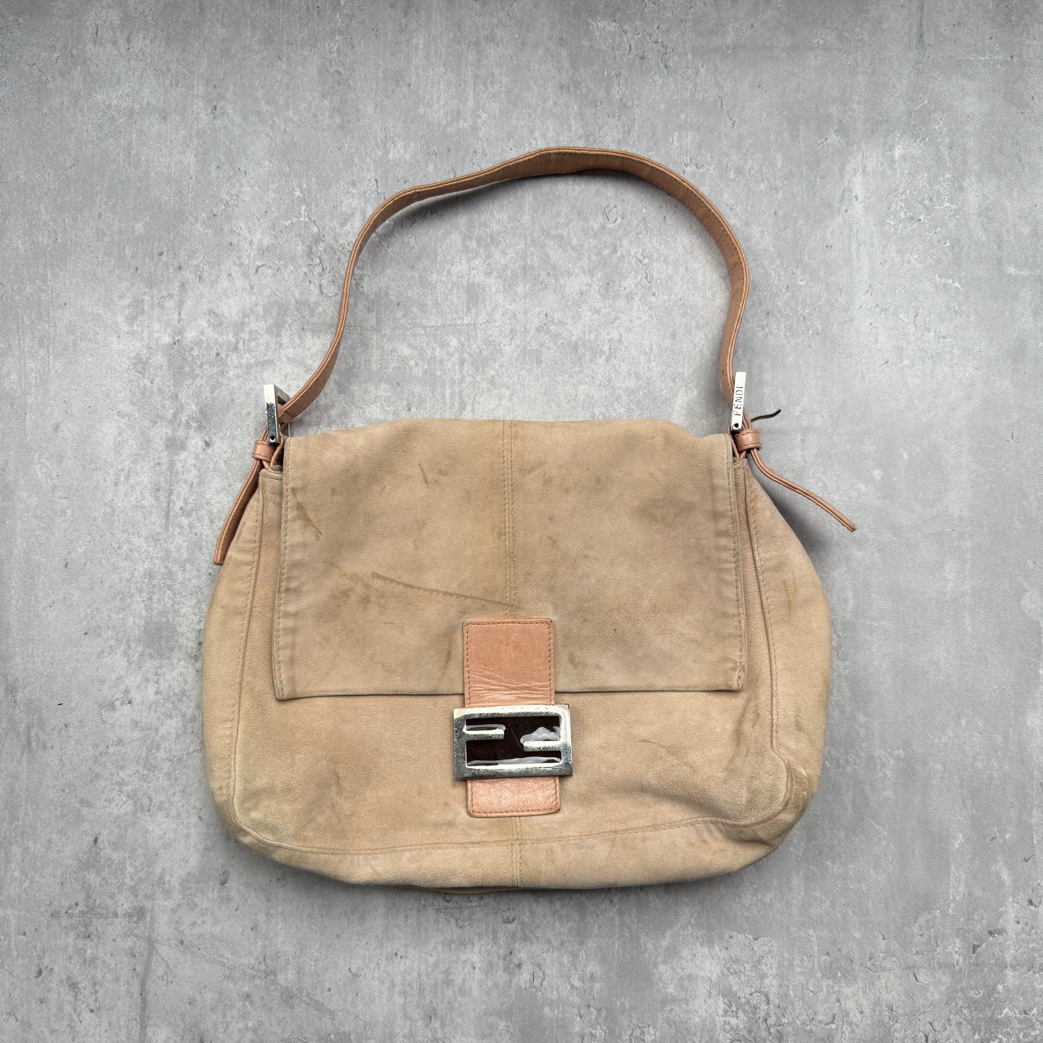Fendi Mamma Baguette Shoulder Bag in nude suede with pink leather trim, silver FF buckle, and soft vintage structure.
