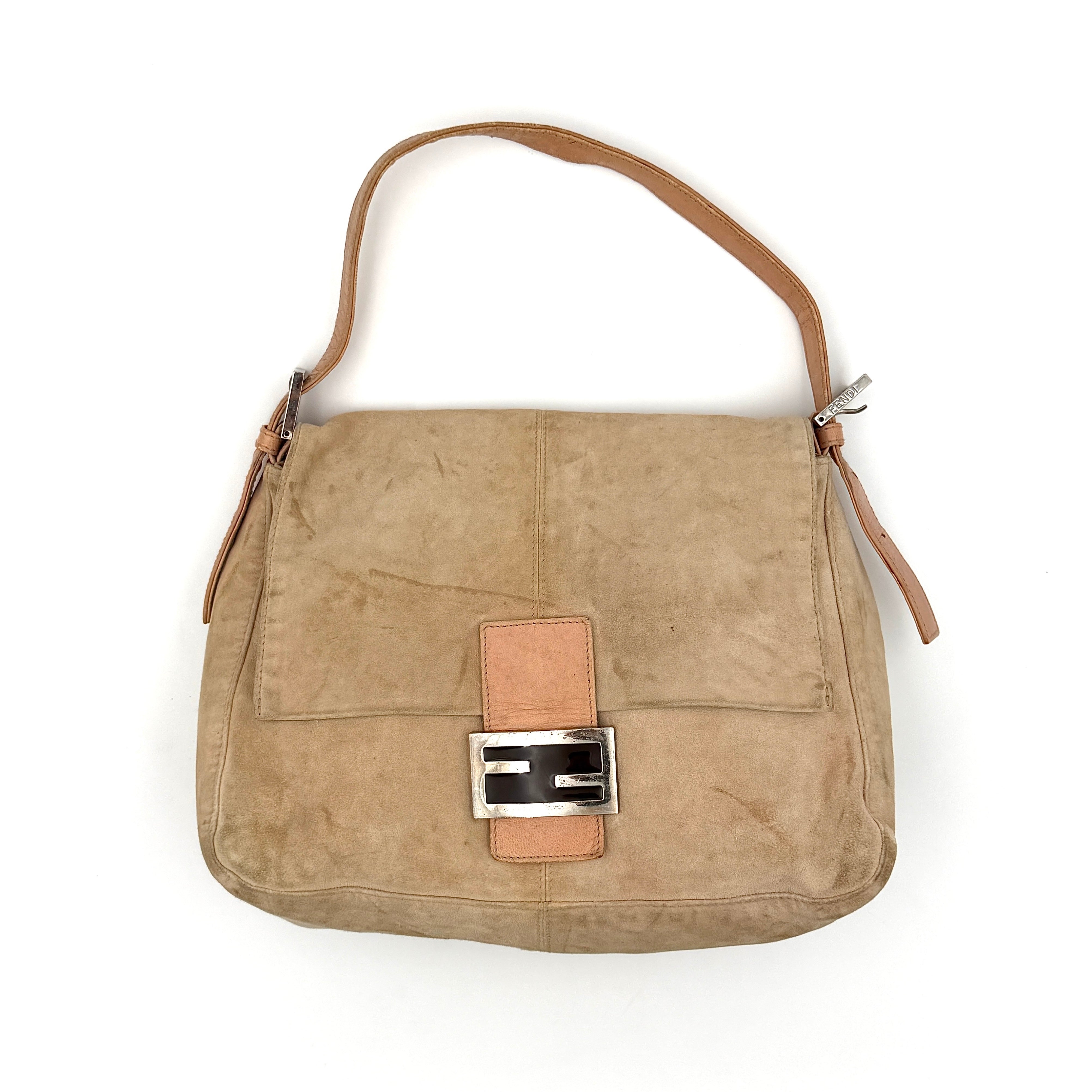 Fendi Mamma Baguette Shoulder Bag in nude suede with pink leather trim, silver FF buckle, and soft vintage structure.