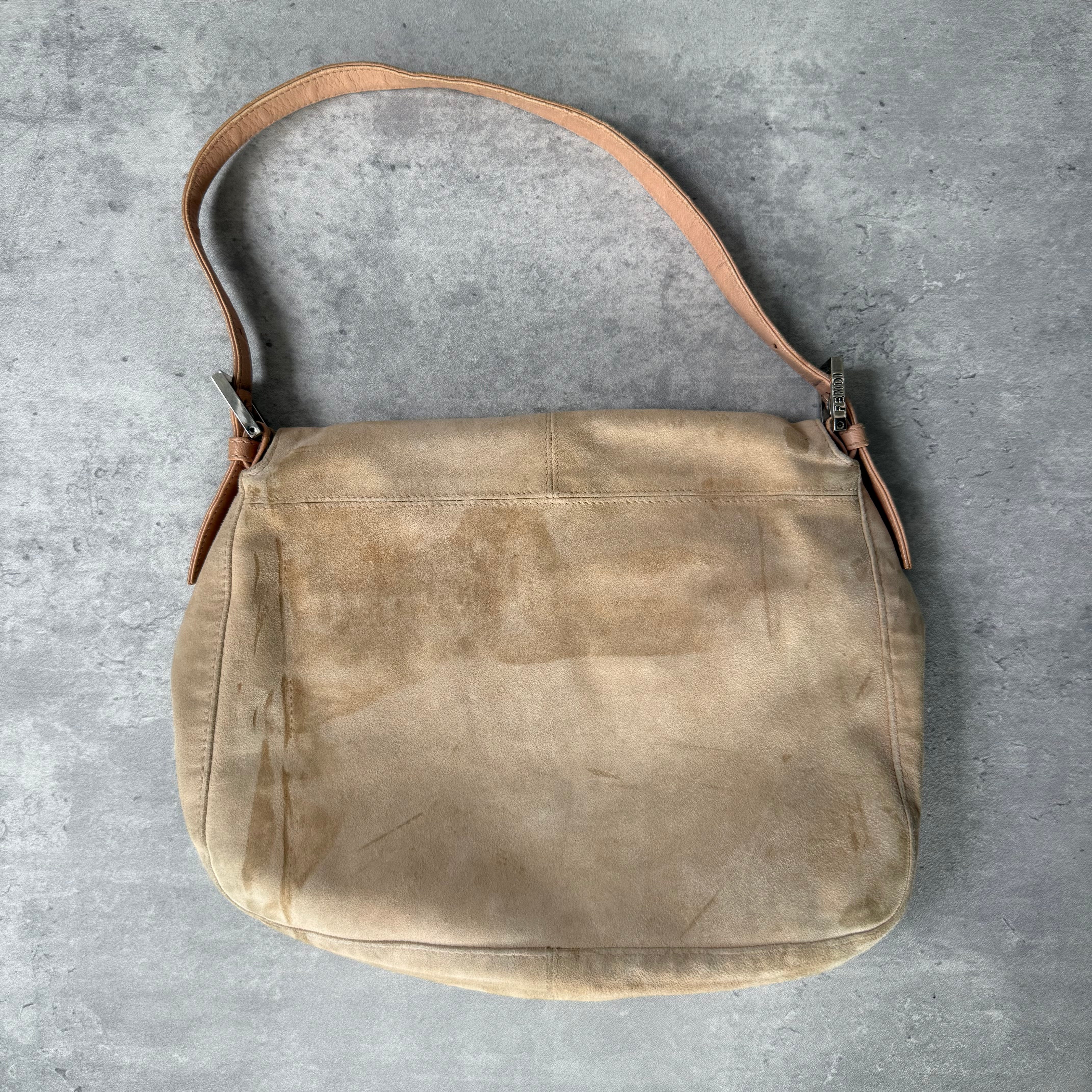 Fendi Mamma Baguette Shoulder Bag in nude suede with pink leather trim, silver FF buckle, and soft vintage structure.
