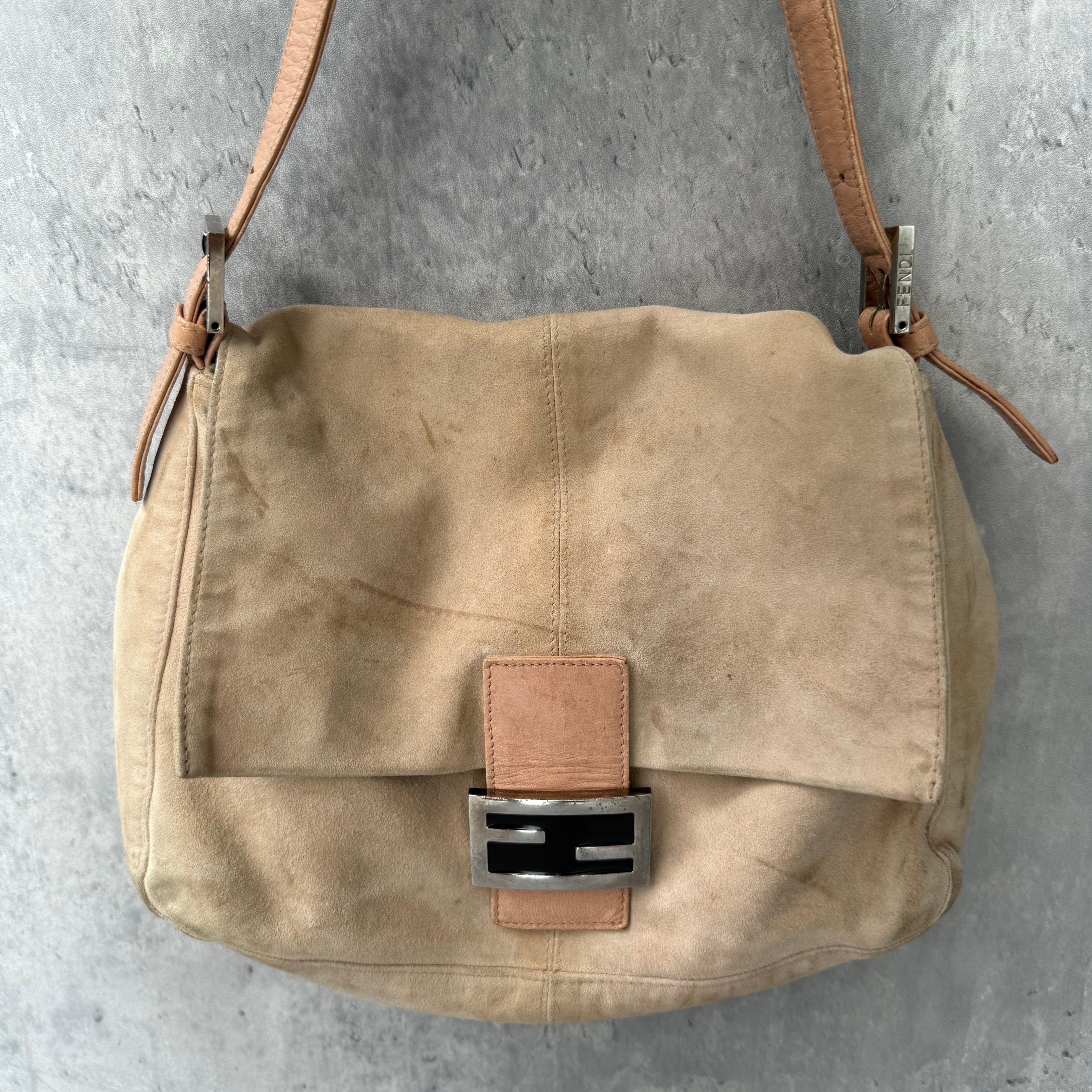 Fendi Mamma Baguette Shoulder Bag in nude suede with pink leather trim, silver FF buckle, and soft vintage structure.