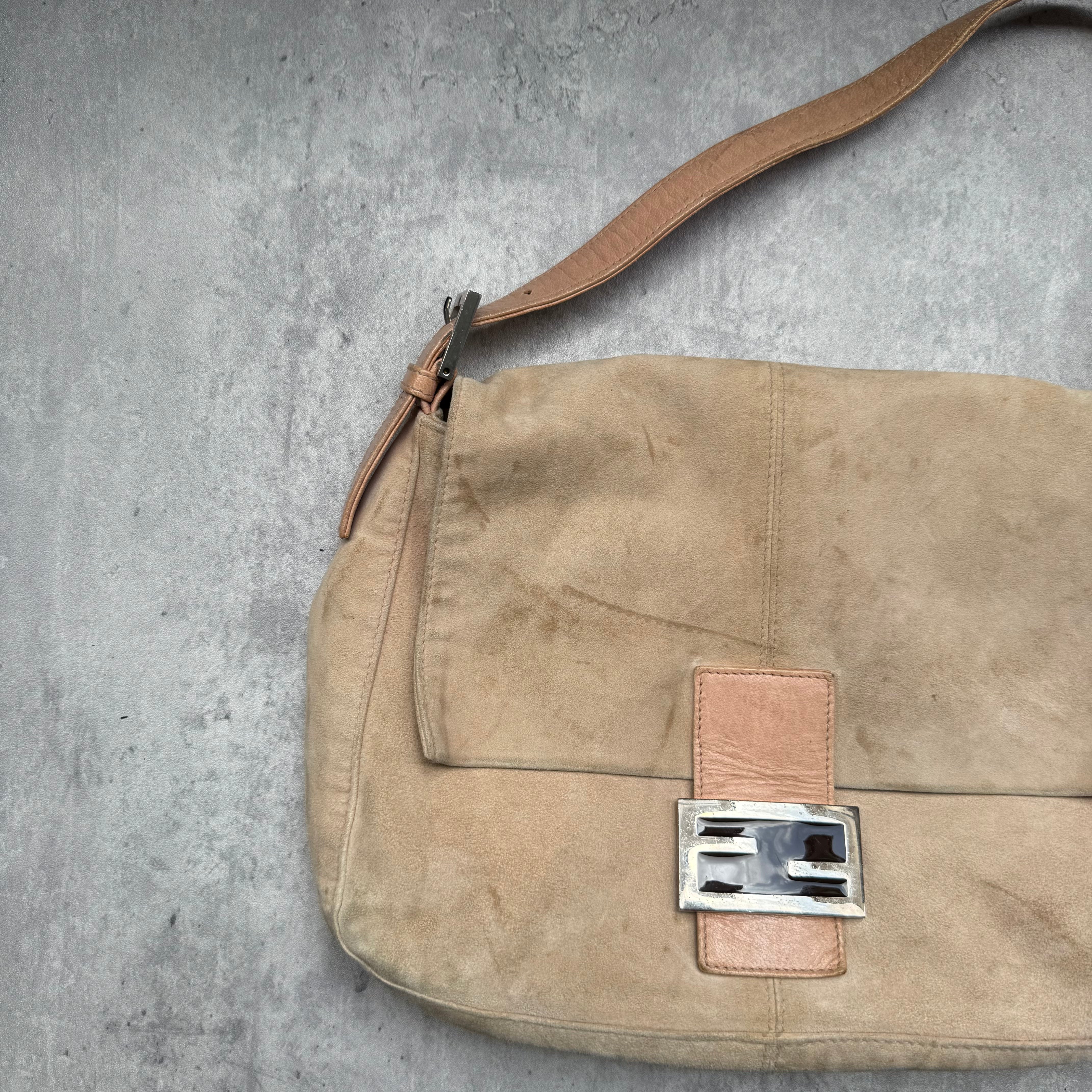 Fendi Mamma Baguette Shoulder Bag in nude suede with pink leather trim, silver FF buckle, and soft vintage structure.