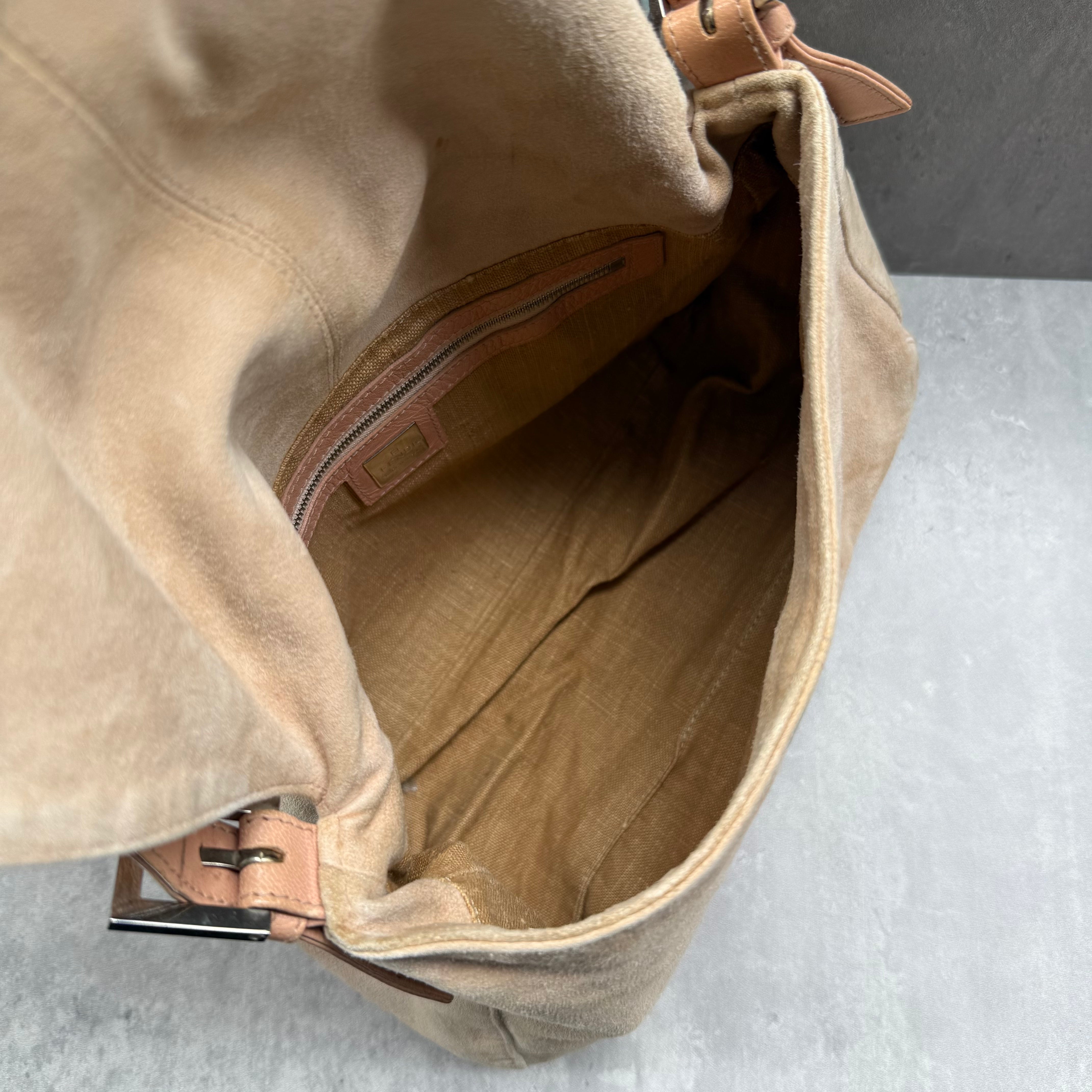 Fendi Mamma Baguette Shoulder Bag in nude suede with pink leather trim, silver FF buckle, and soft vintage structure.