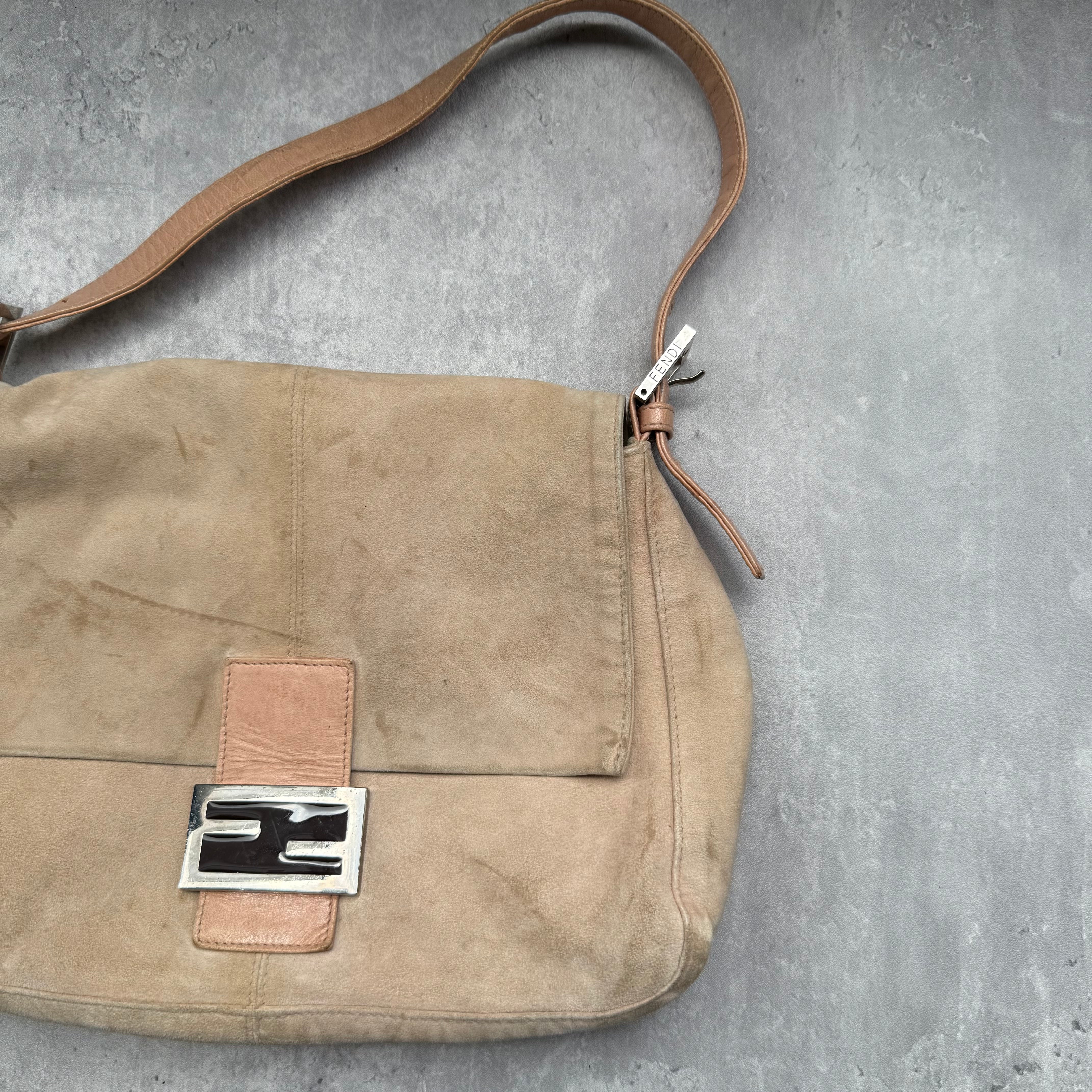 Fendi Mamma Baguette Shoulder Bag in nude suede with pink leather trim, silver FF buckle, and soft vintage structure.