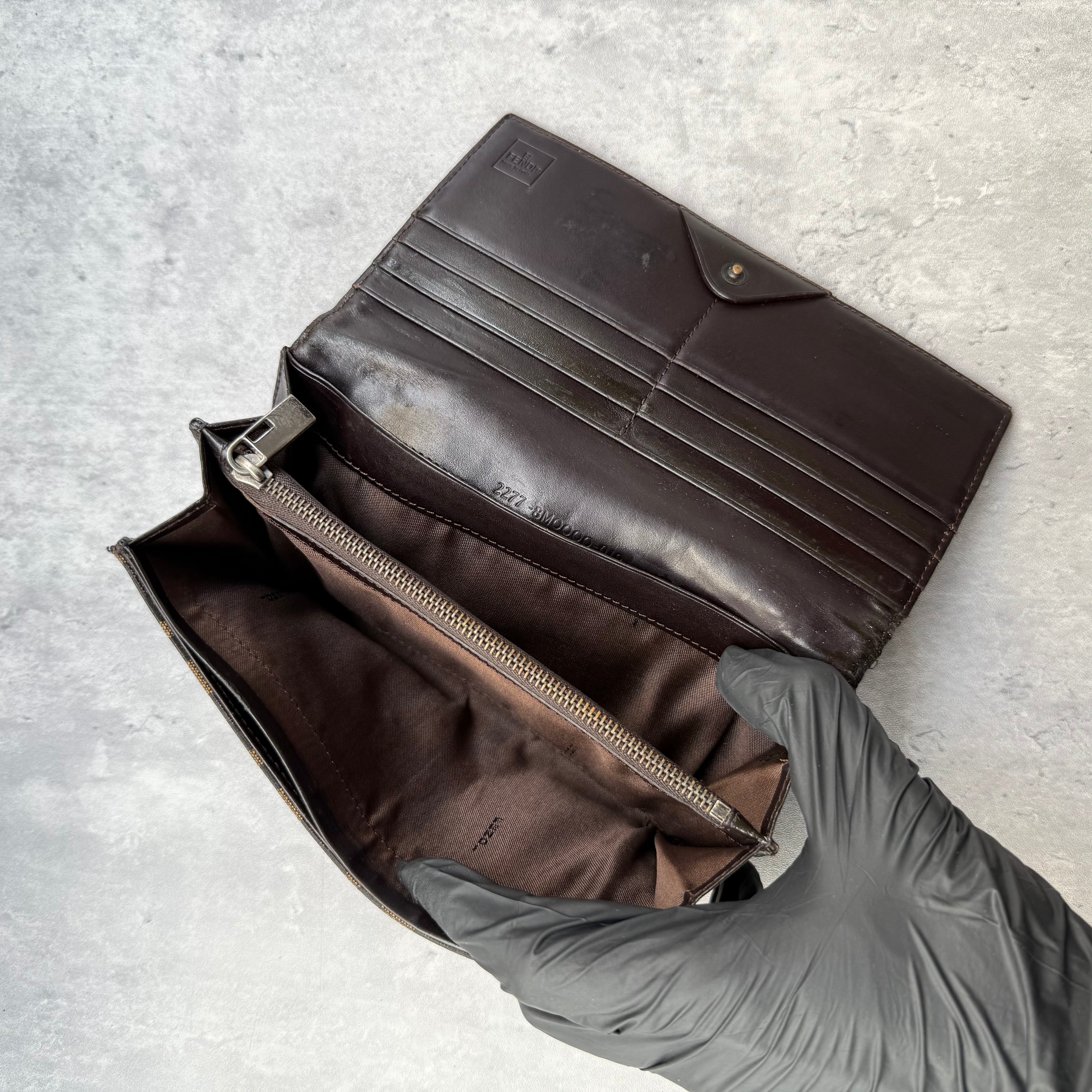 Fendi Zucca Canvas Long Wallet with brown leather interior, featuring FF monogram and snap closure