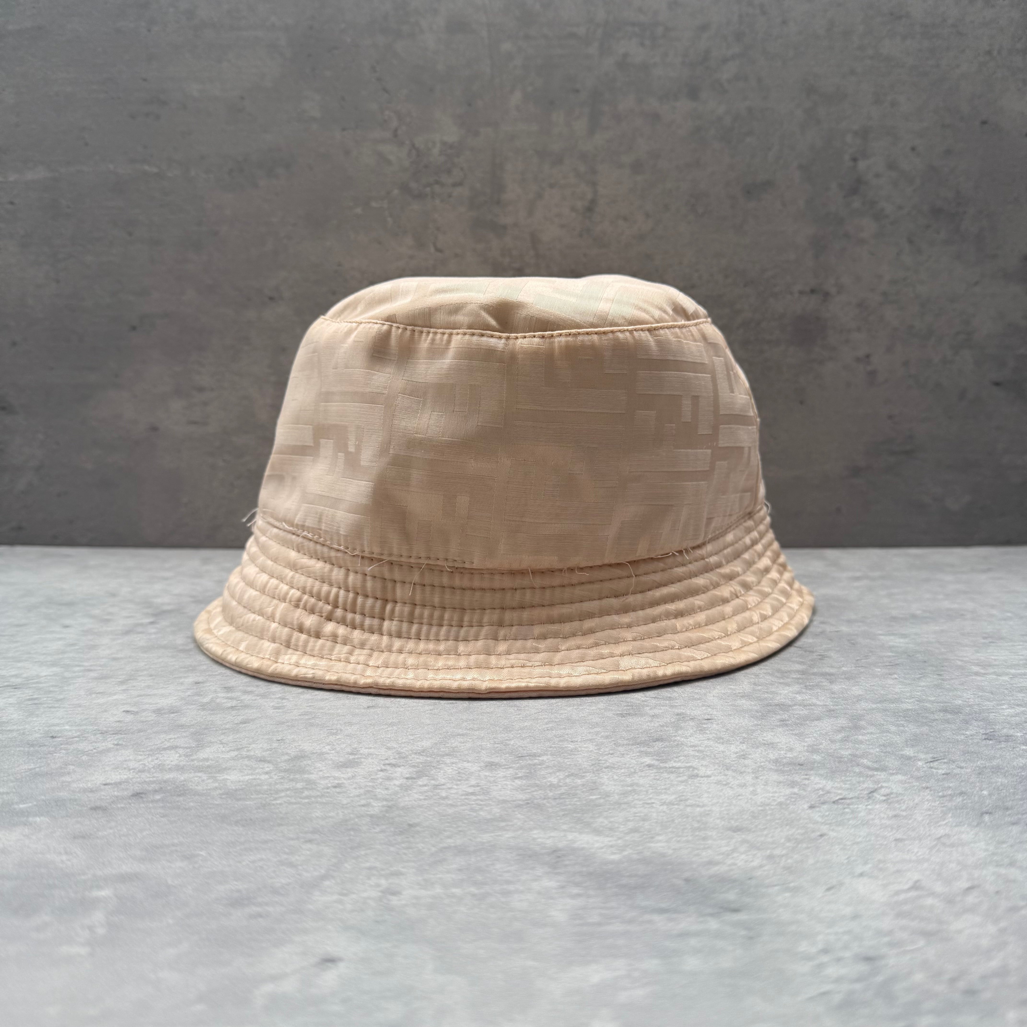 Fendi Zucca Pattern Bucket Hat in cream, featuring tonal jacquard Zucca monogram and soft brim design.
