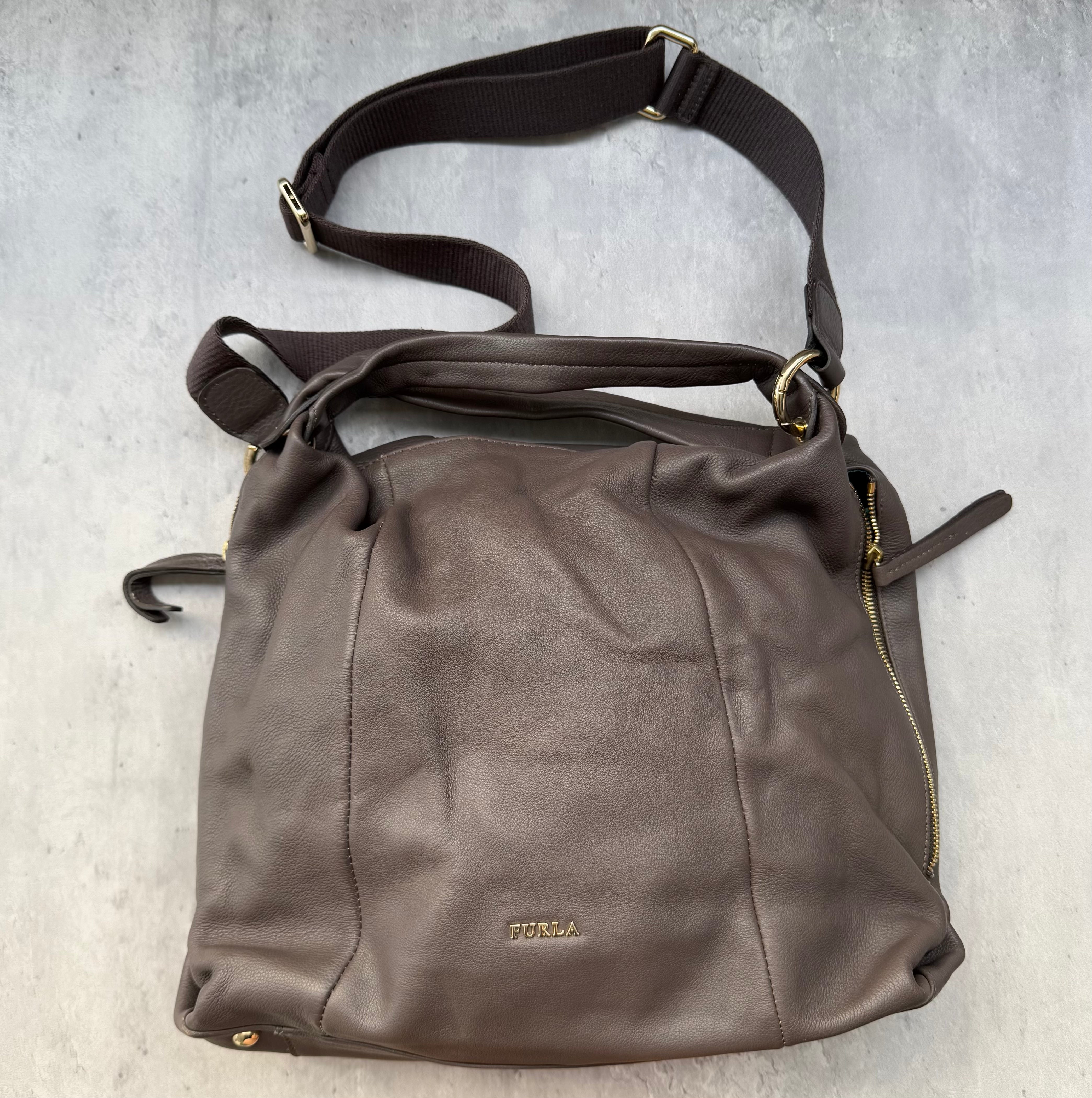 Furla 2Way Liz Daino Hobo Shoulder Bag in brown pebbled leather with gold-tone hardware, teal monogram interior, and adjustable strap.