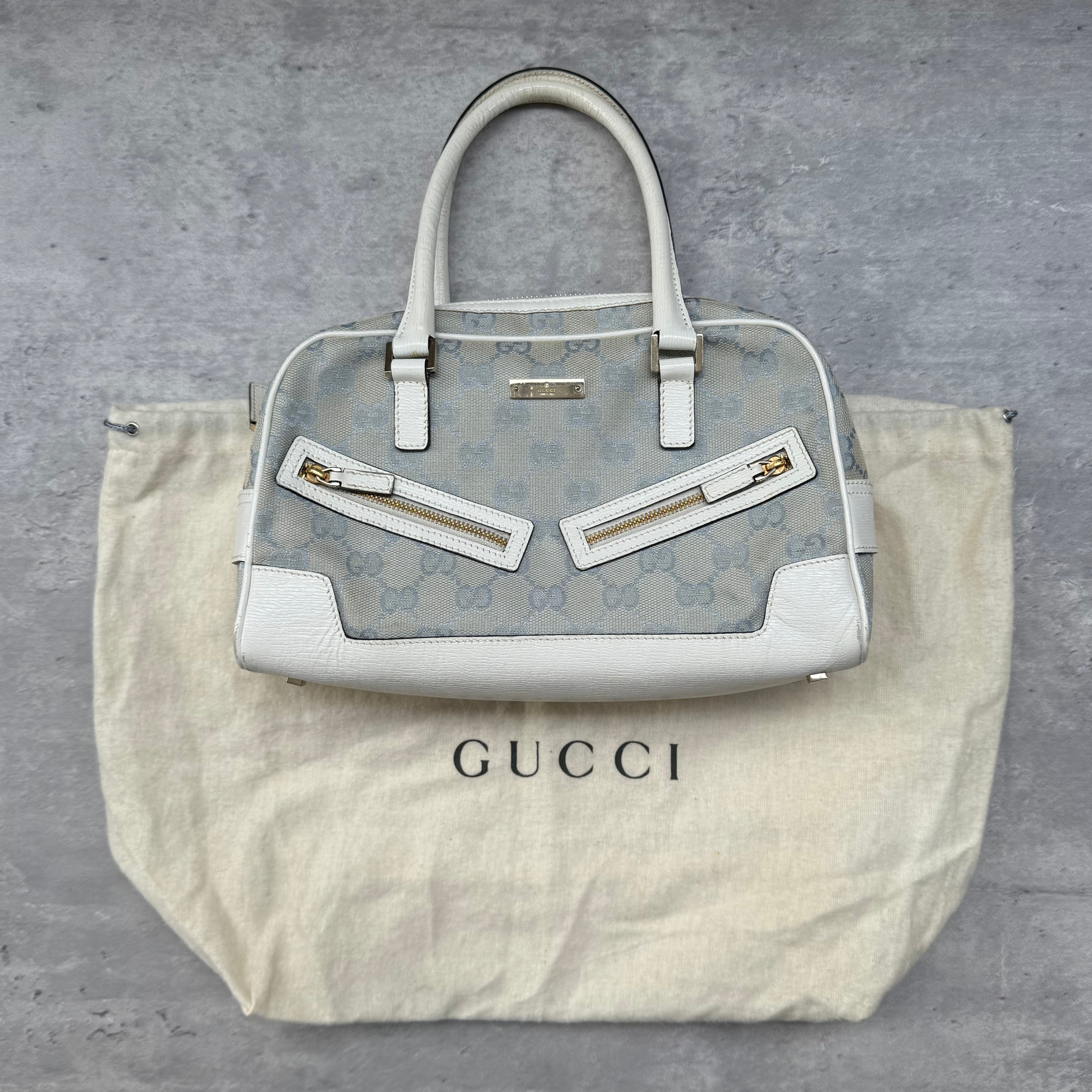 Gucci GG Canvas Boston Bowler Shoulder Bag in light blue with white leather trim, gold-tone hardware, and official Gucci dustbag