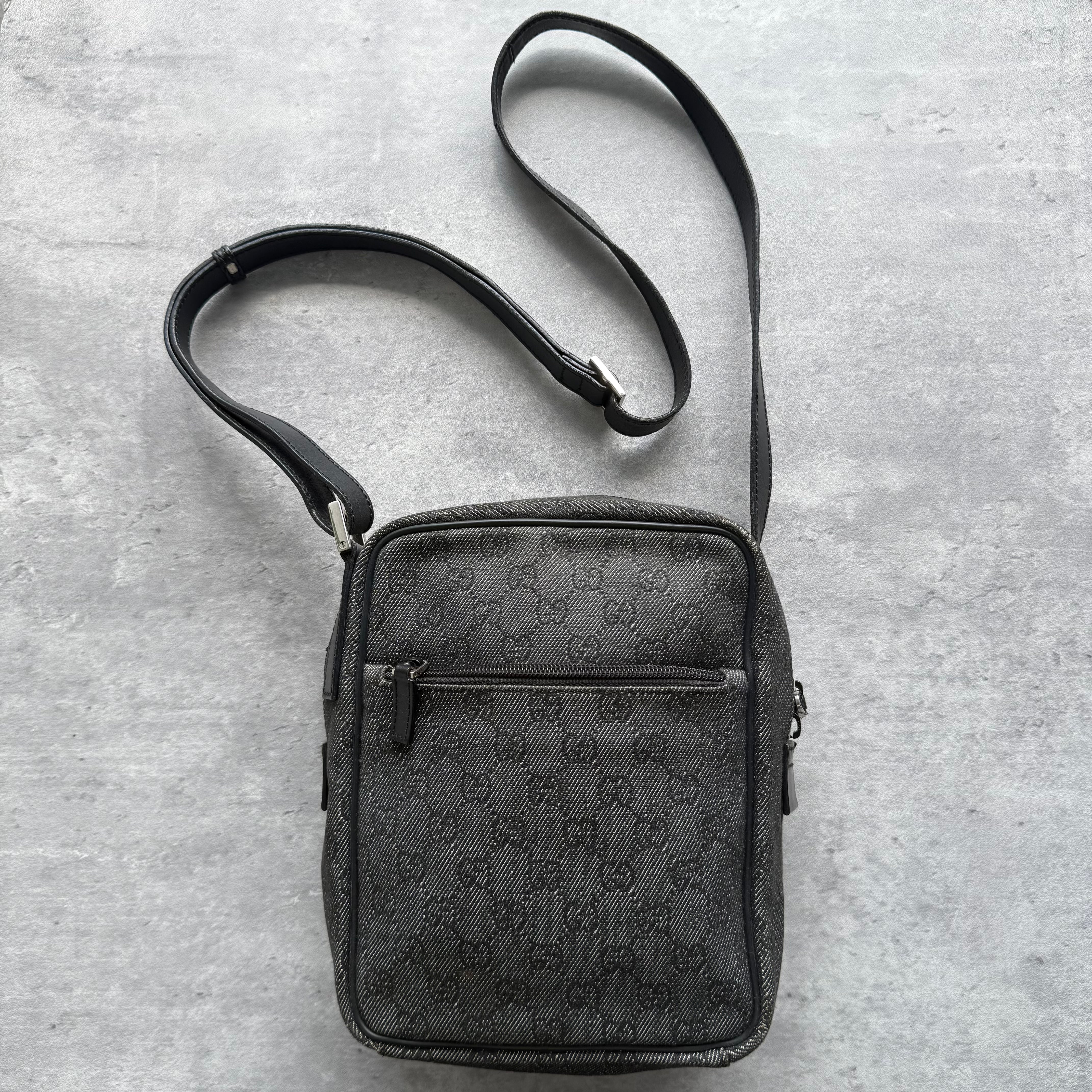 Gucci GG Monogram Crossbody Bag in black, crafted from GG canvas with leather trim and silver-tone hardware.