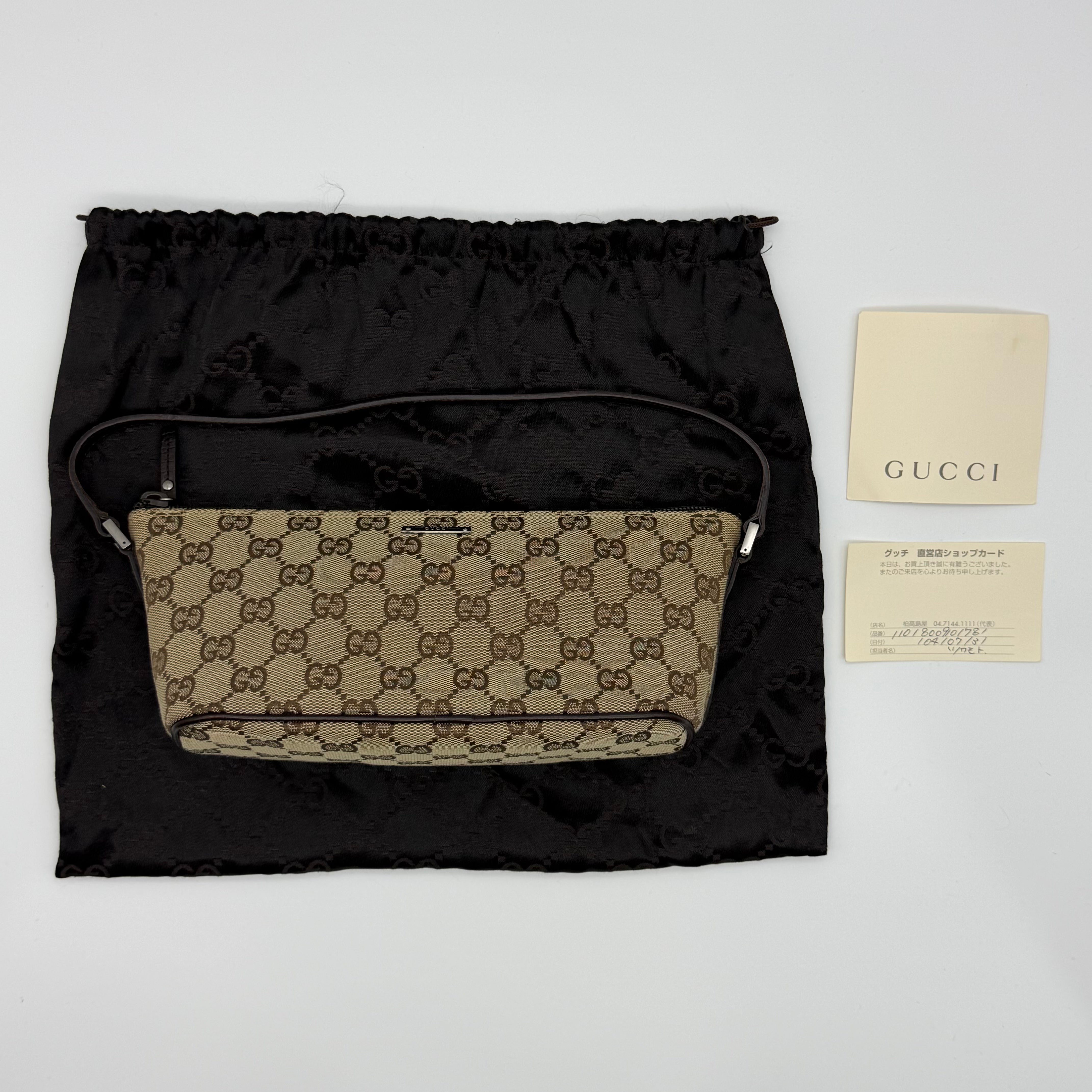 Gucci GG Monogram Pochette Boat shoulder bag in beige canvas with leather trim and zip-top — pre-loved.