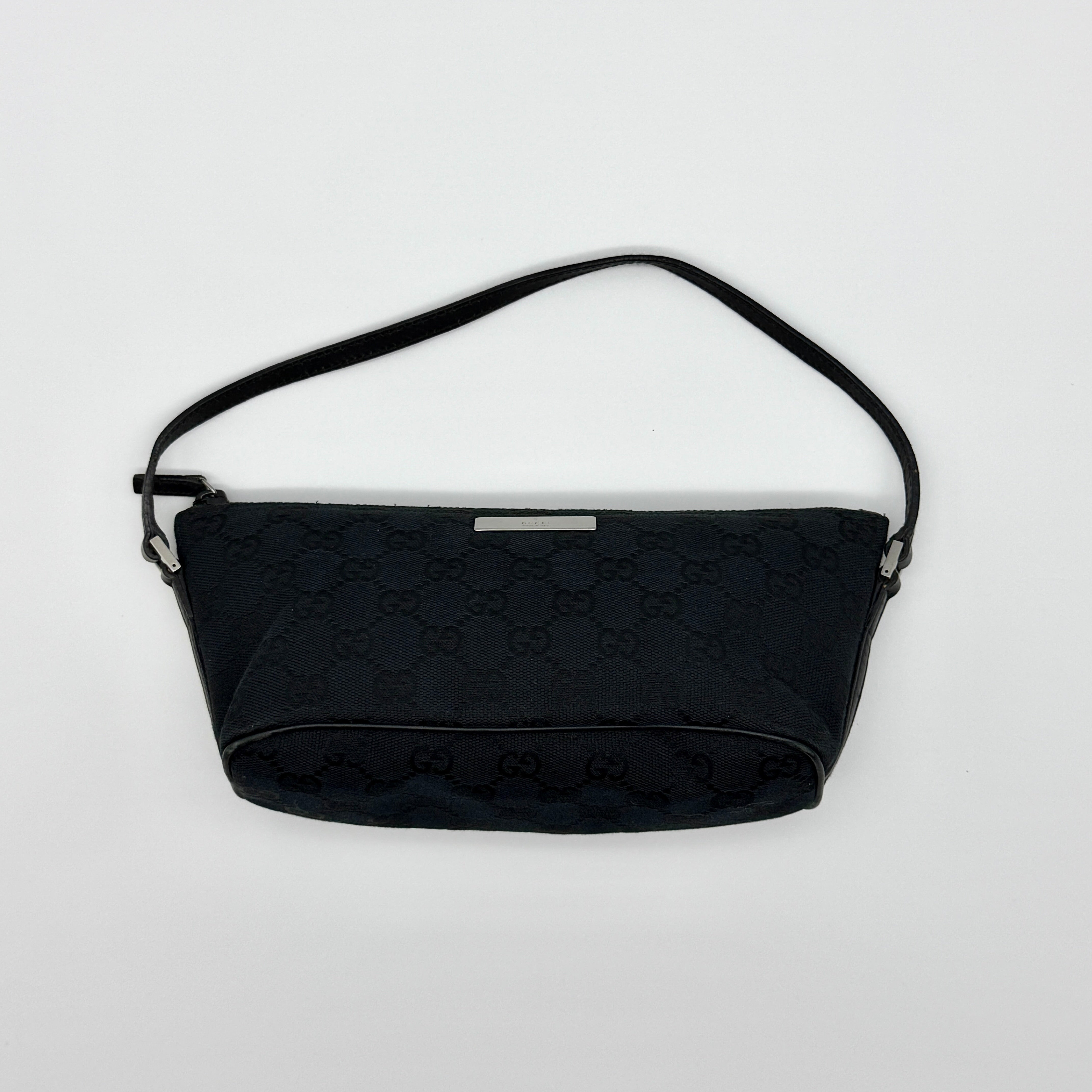 Gucci GG Monogram Pochette Boat Shoulder Bag in black jacquard fabric with leather strap and silver-tone logo plate — pre-loved.