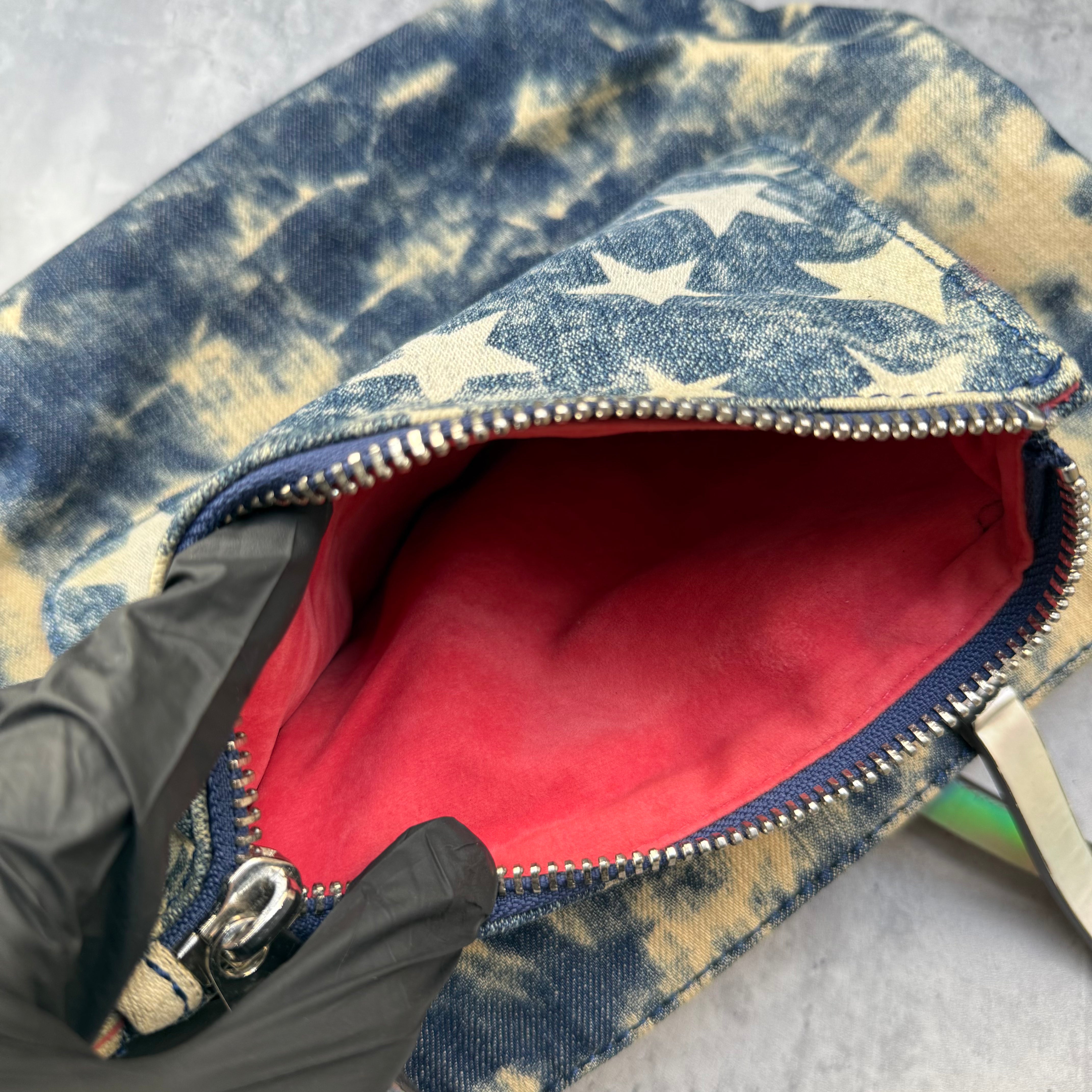 Guess Y2K Blue Denim Tote Bag with bleached star print, iridescent straps, red interior, and front Guess logo plaque.