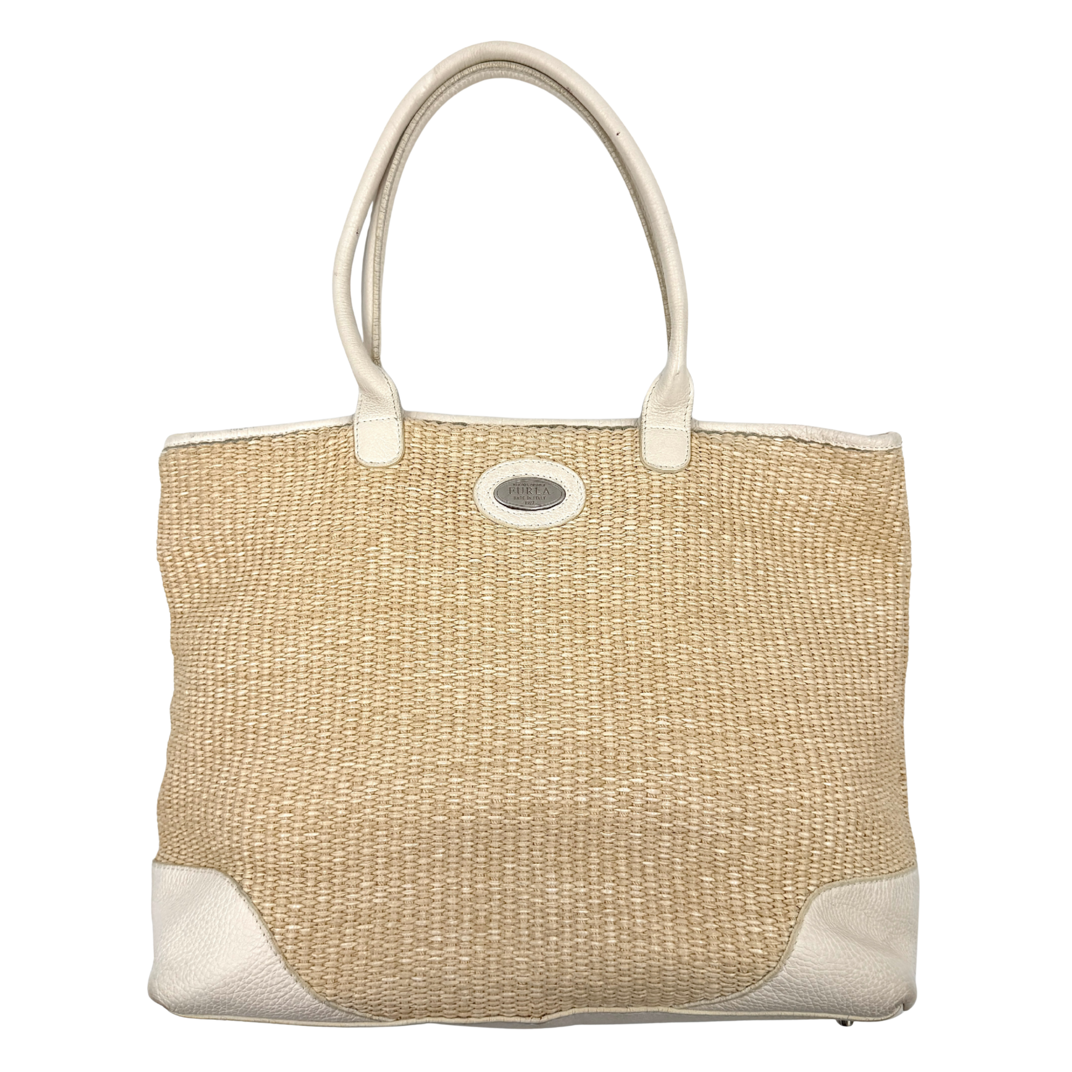 Furla beige woven straw tote bag with off-white leather handles and corners, featuring a silver oval logo plaque.