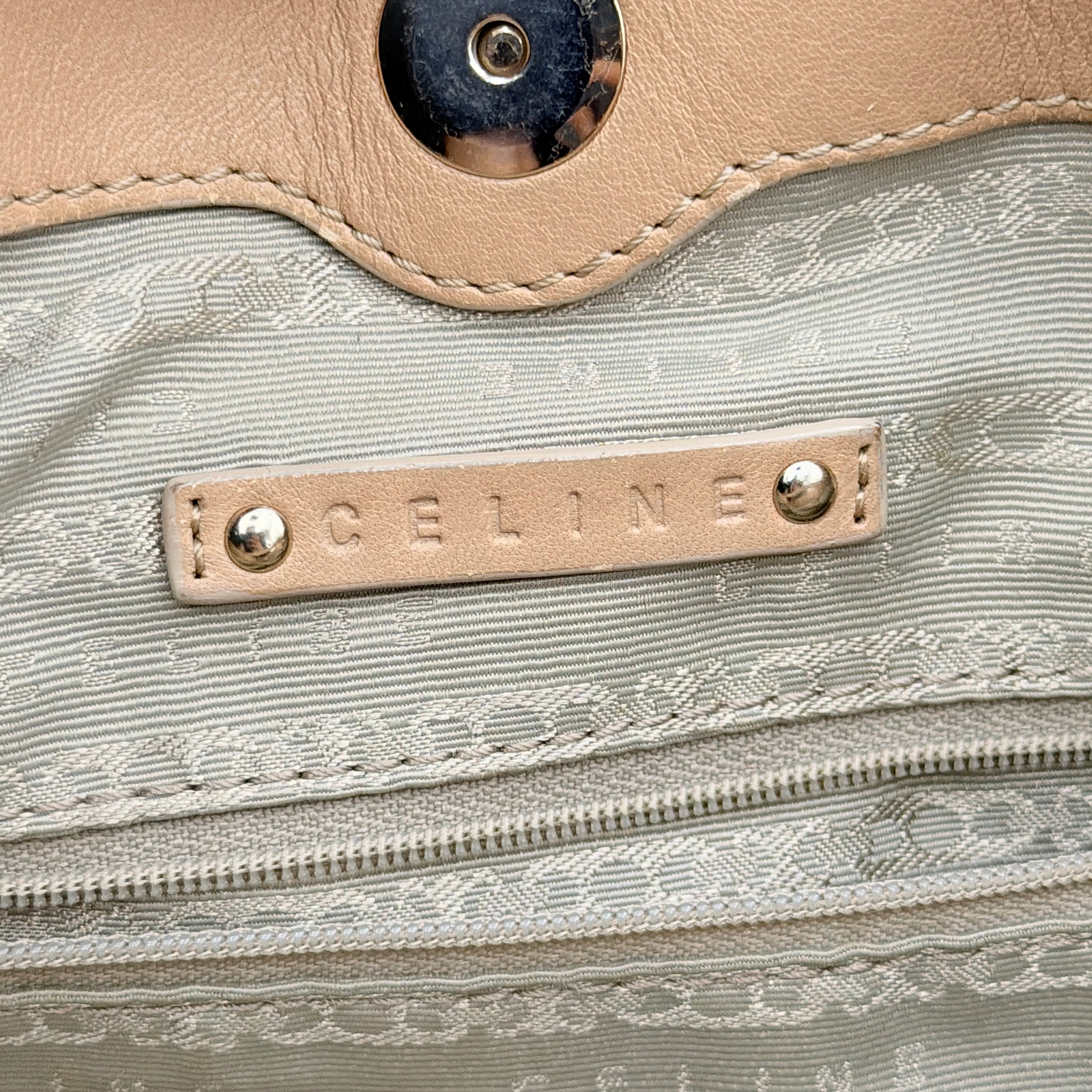 Celine 2Way Leather Shoulder Bag in muted brown leather with gold-tone hardware, adjustable strap, and double handles.