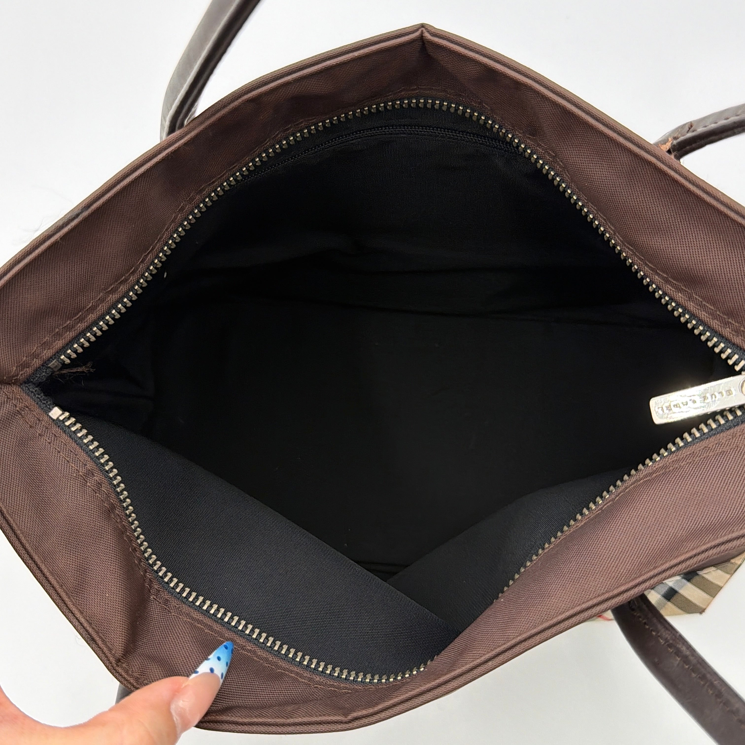 Burberry Blue Label nylon tote bag in brown with iconic check-detail base and structured double handles.