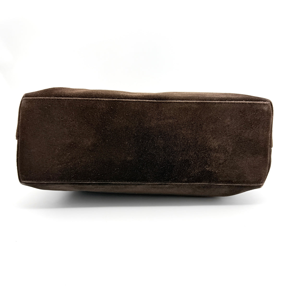 Gucci Bamboo Shoulder Bag in brown suede with a sculpted bamboo handle, photographed on a white background.