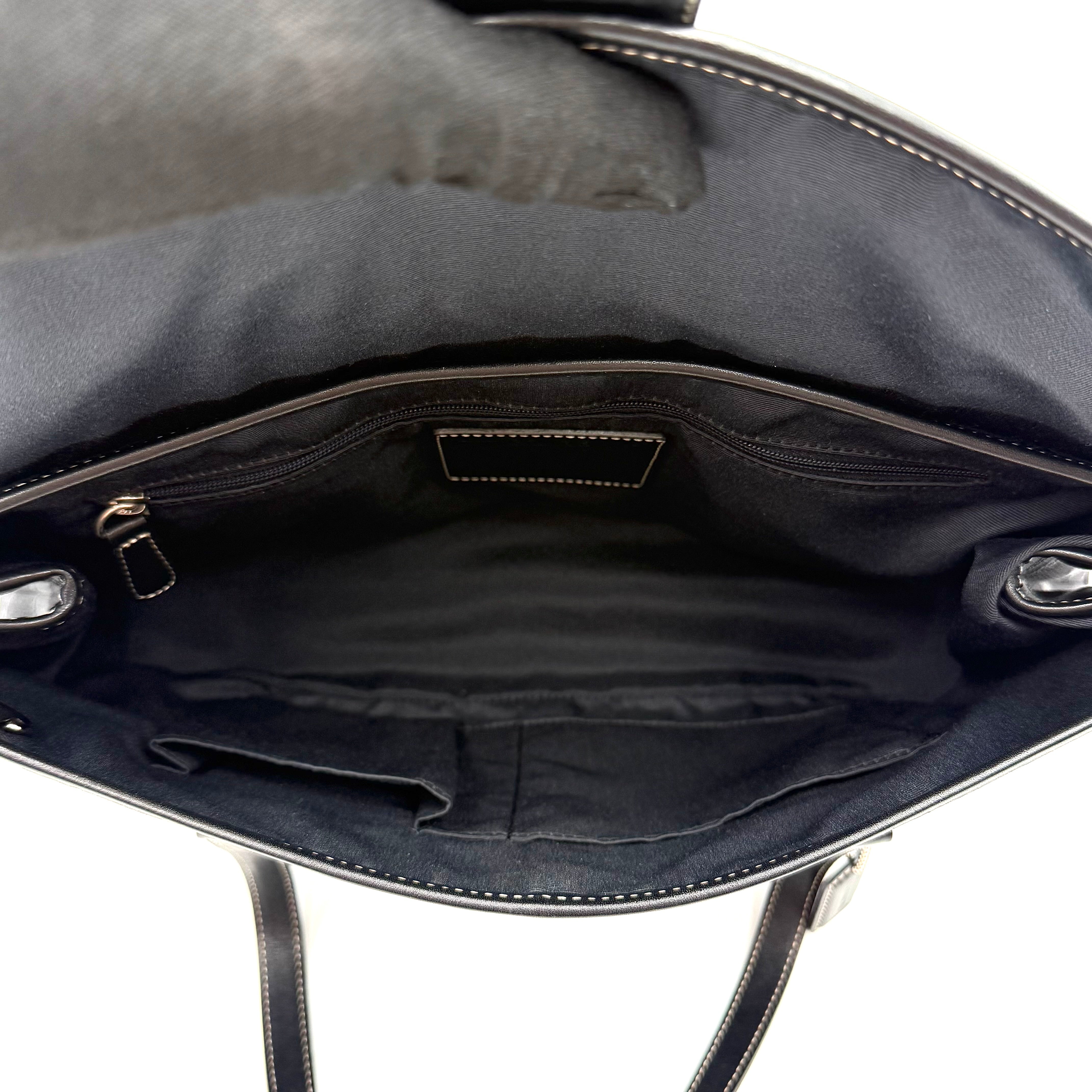Coach black Soho Hampton Buckle Flap Shoulder Bag with jacquard pattern, leather trim, and silver buckle detail.