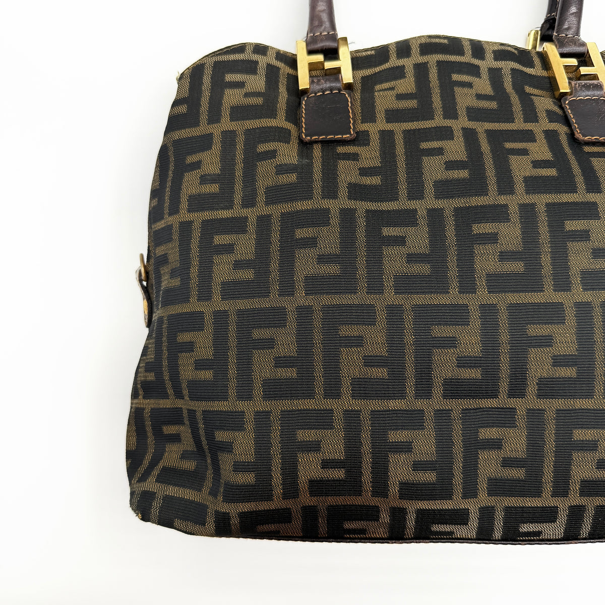 Fendi Zucca FF Monogram Handbag in brown canvas with leather handles and gold hardware, displayed against a clean background.
