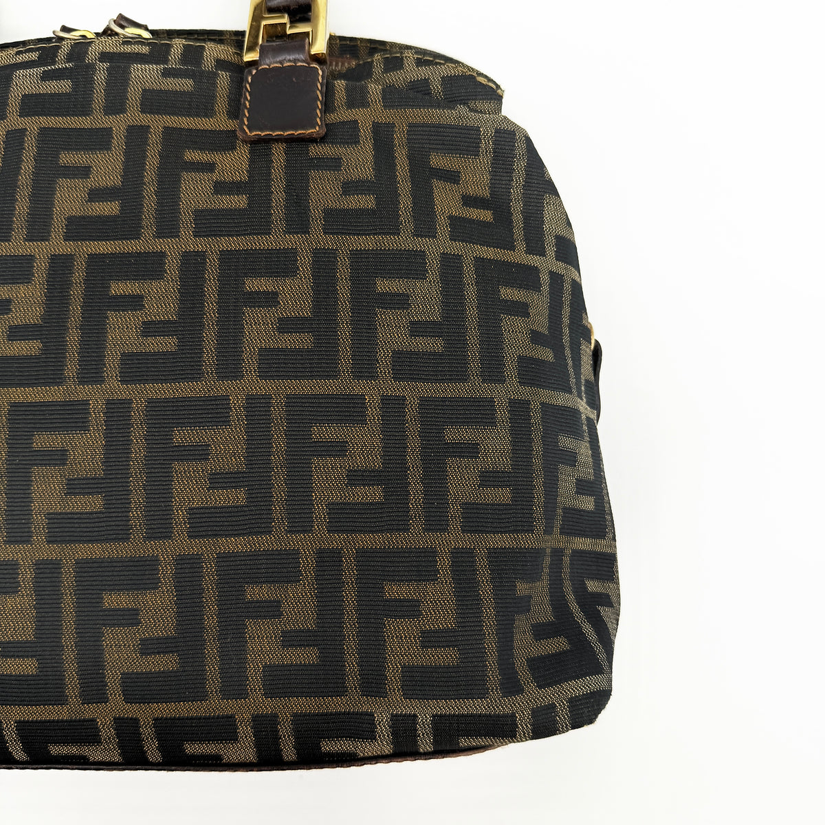 Fendi Zucca FF Monogram Handbag in brown canvas with leather handles and gold hardware, displayed against a clean background.