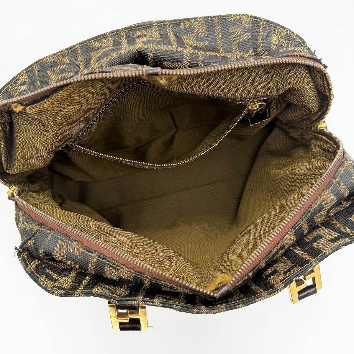 Fendi Zucca FF Monogram Handbag in brown canvas with leather handles and gold hardware, displayed against a clean background.