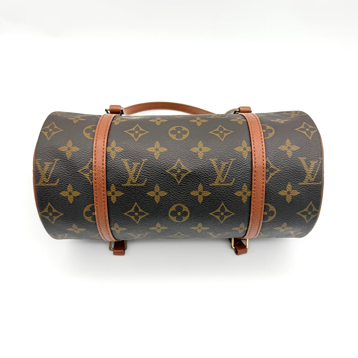 Louis Vuitton Papillon 26 in monogram canvas with leather handles and gold zipper, shown on a white background.