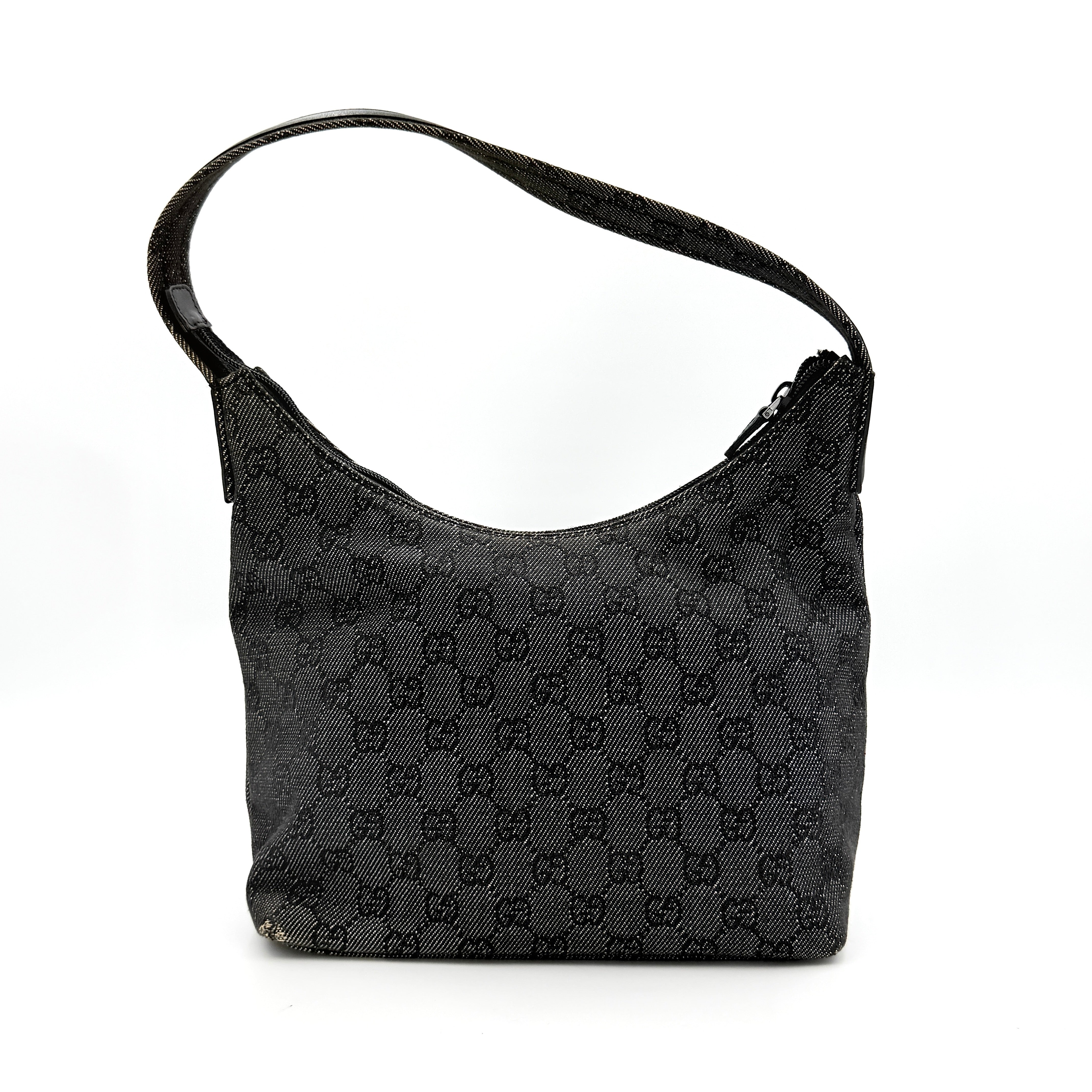 Gucci GG Monogram Hobo Shoulder Bag in black canvas with tonal GG pattern and a curved shoulder strap, photographed on a white background.