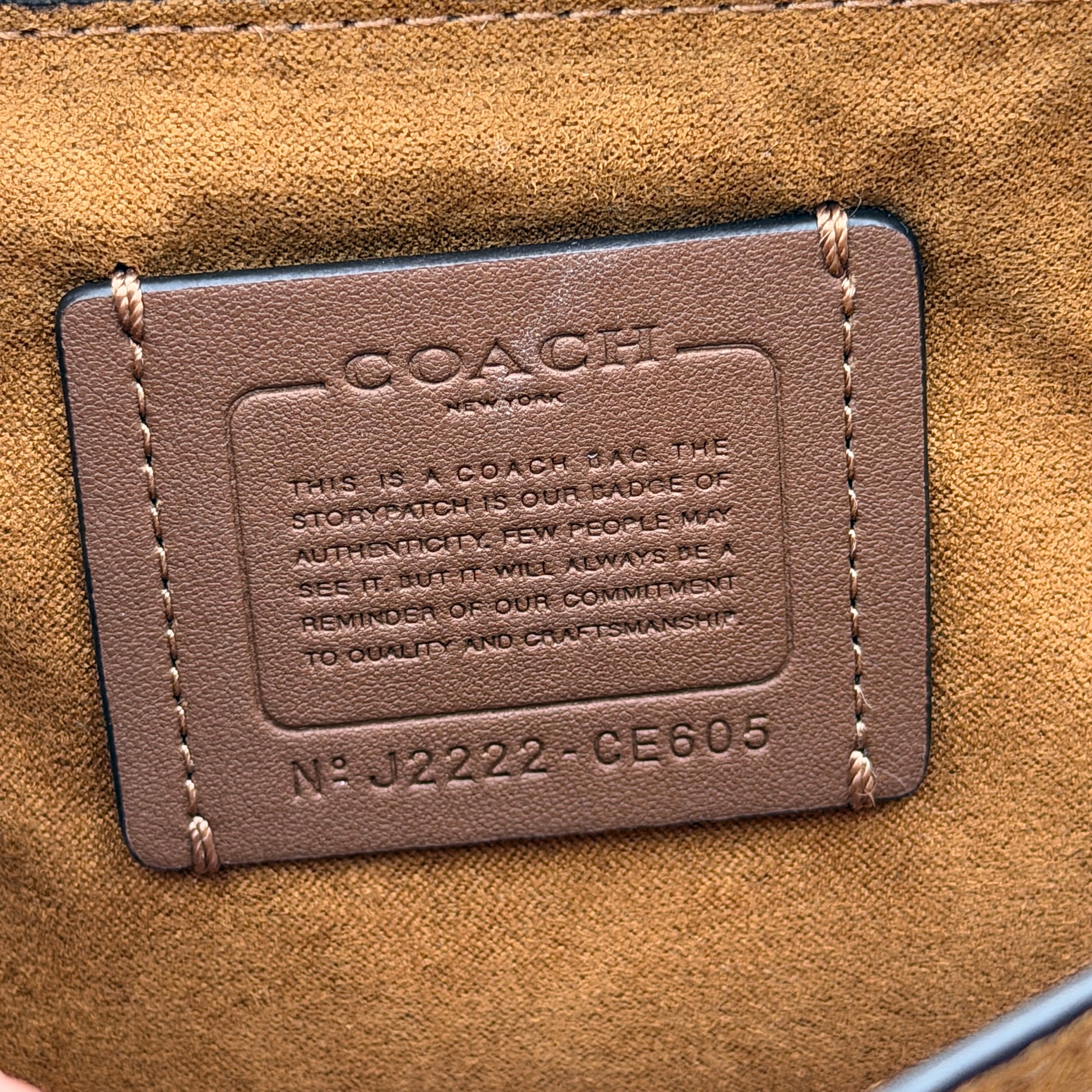 Coach Grace Shoulder Bag in ivory croc-embossed leather with gold-tone carriage plaque and structured shoulder strap.