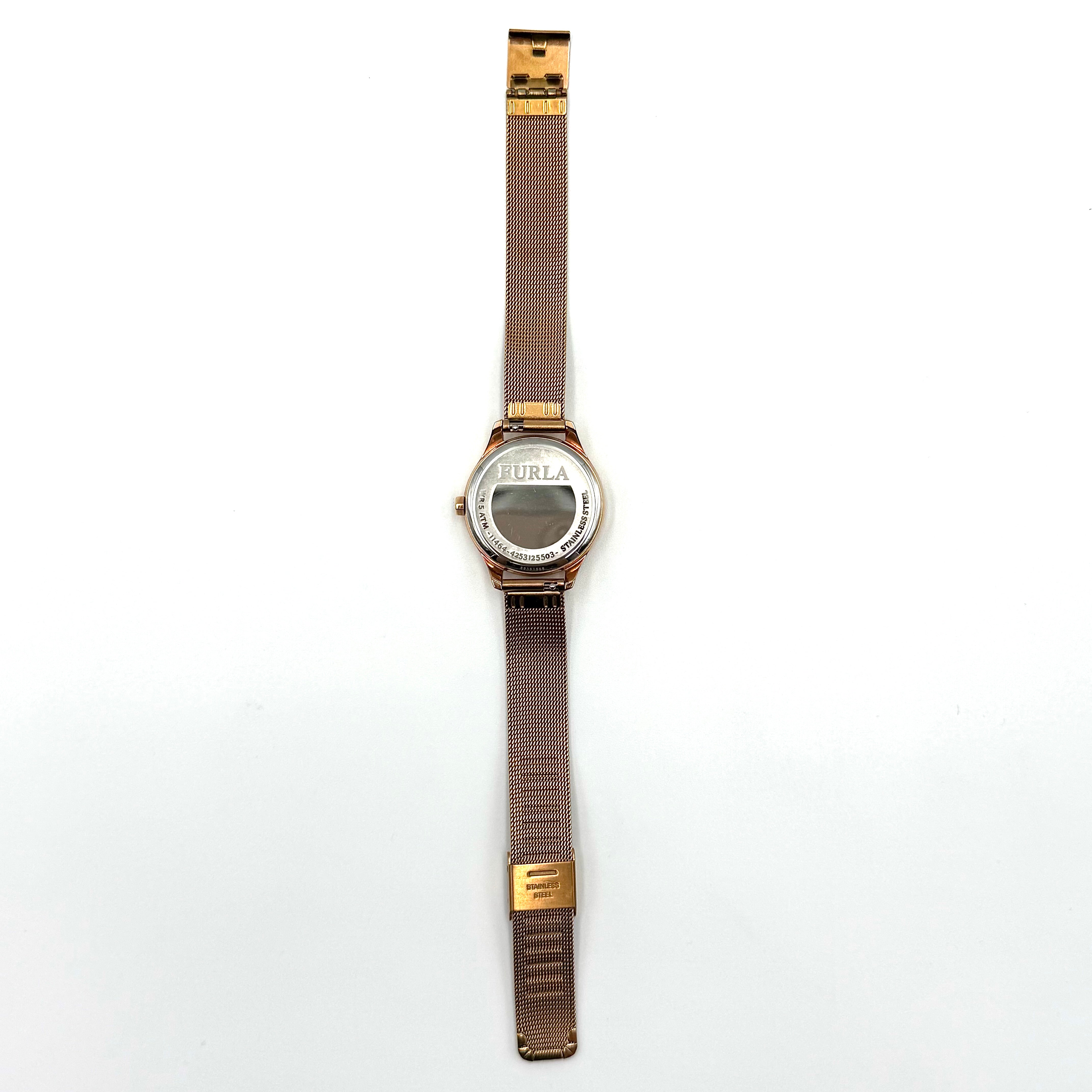 Furla WR 5 ATM watch with pink dial and rose gold Milanese mesh strap displayed on a black cushion.