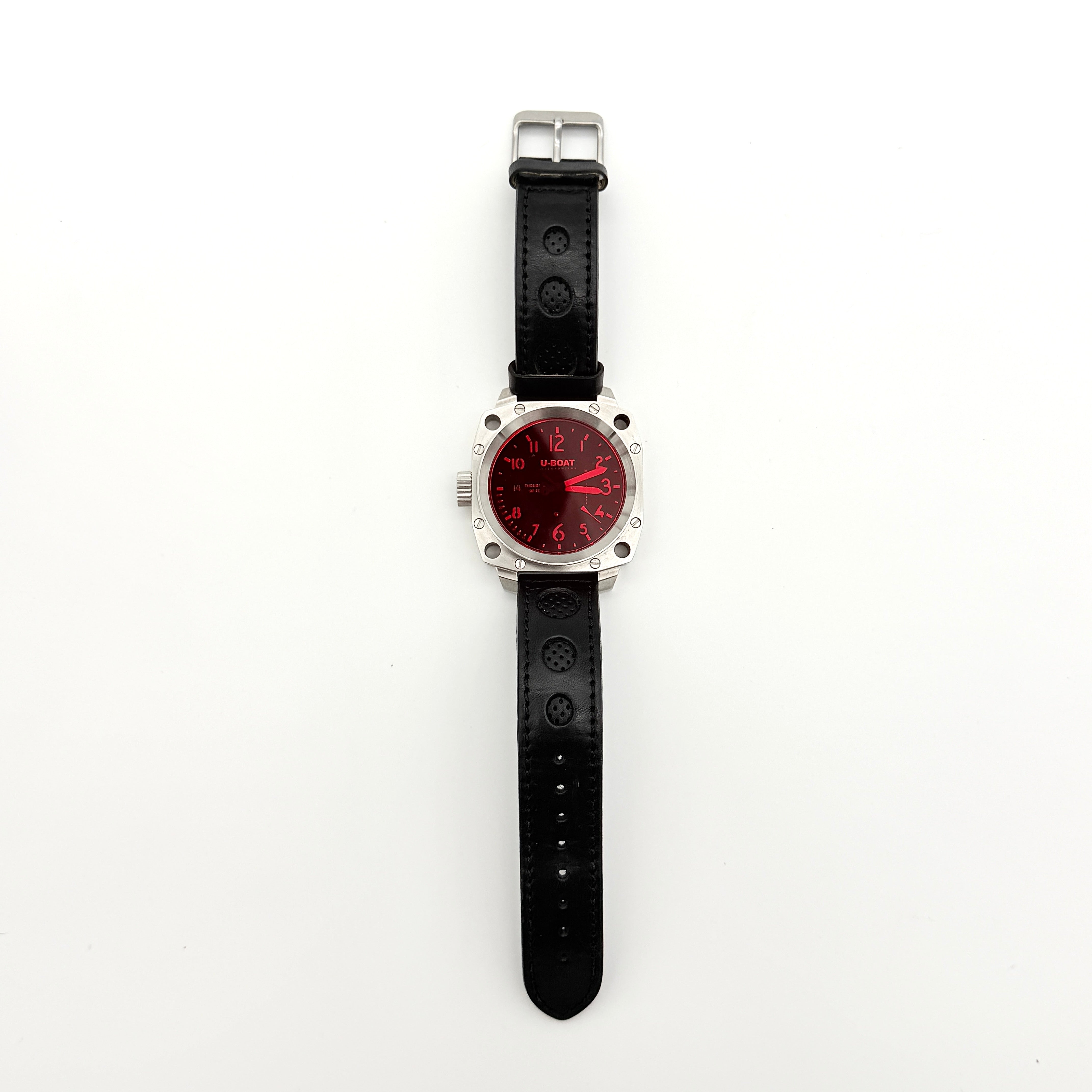 U-Boat Thousands Of Feet stainless steel watch with red dial and black leather strap, displayed on black branded box