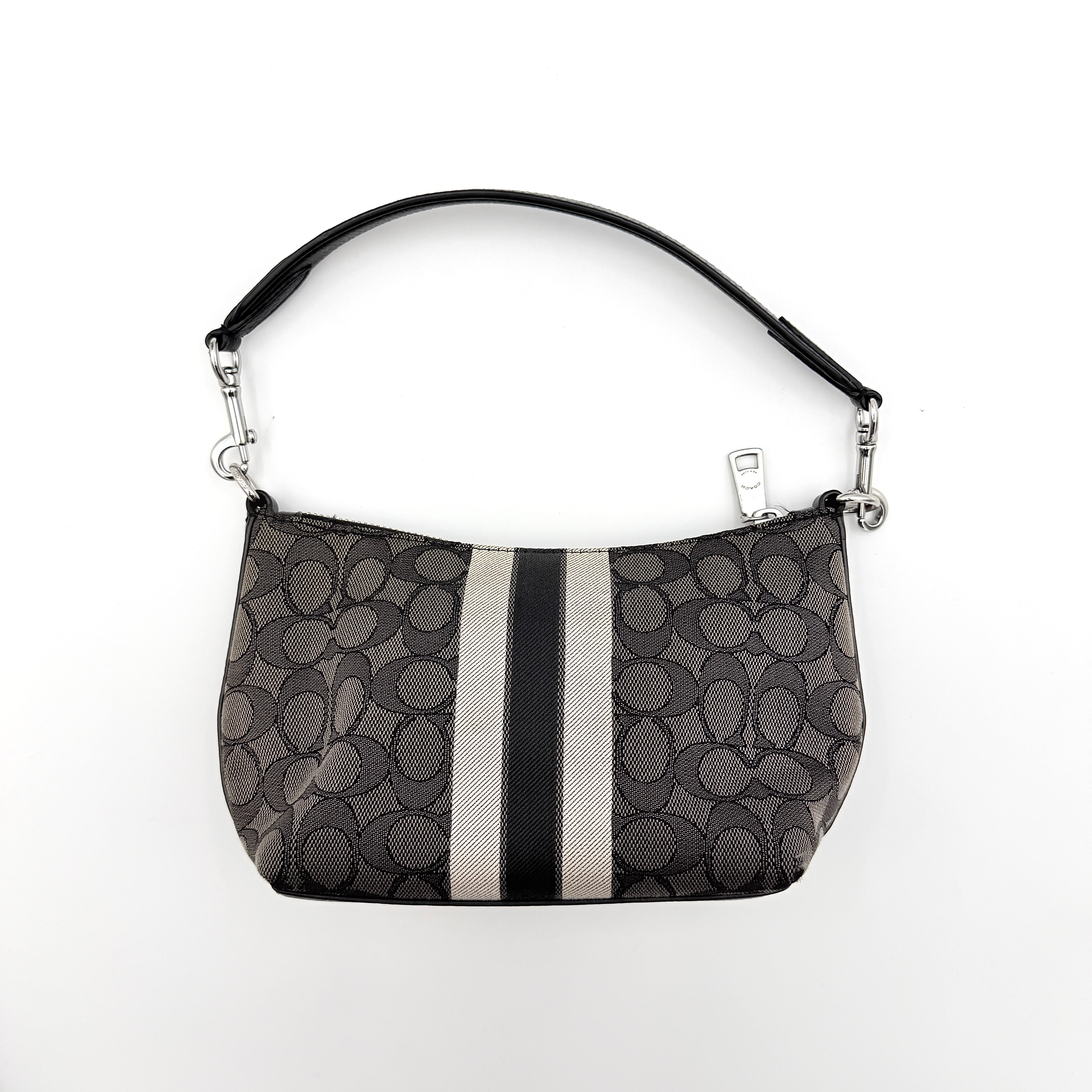 The Coach 2Way Signature Dempsey Stripe Shoulder Bag in black and grey canvas with detachable straps, shown flat on a white background.