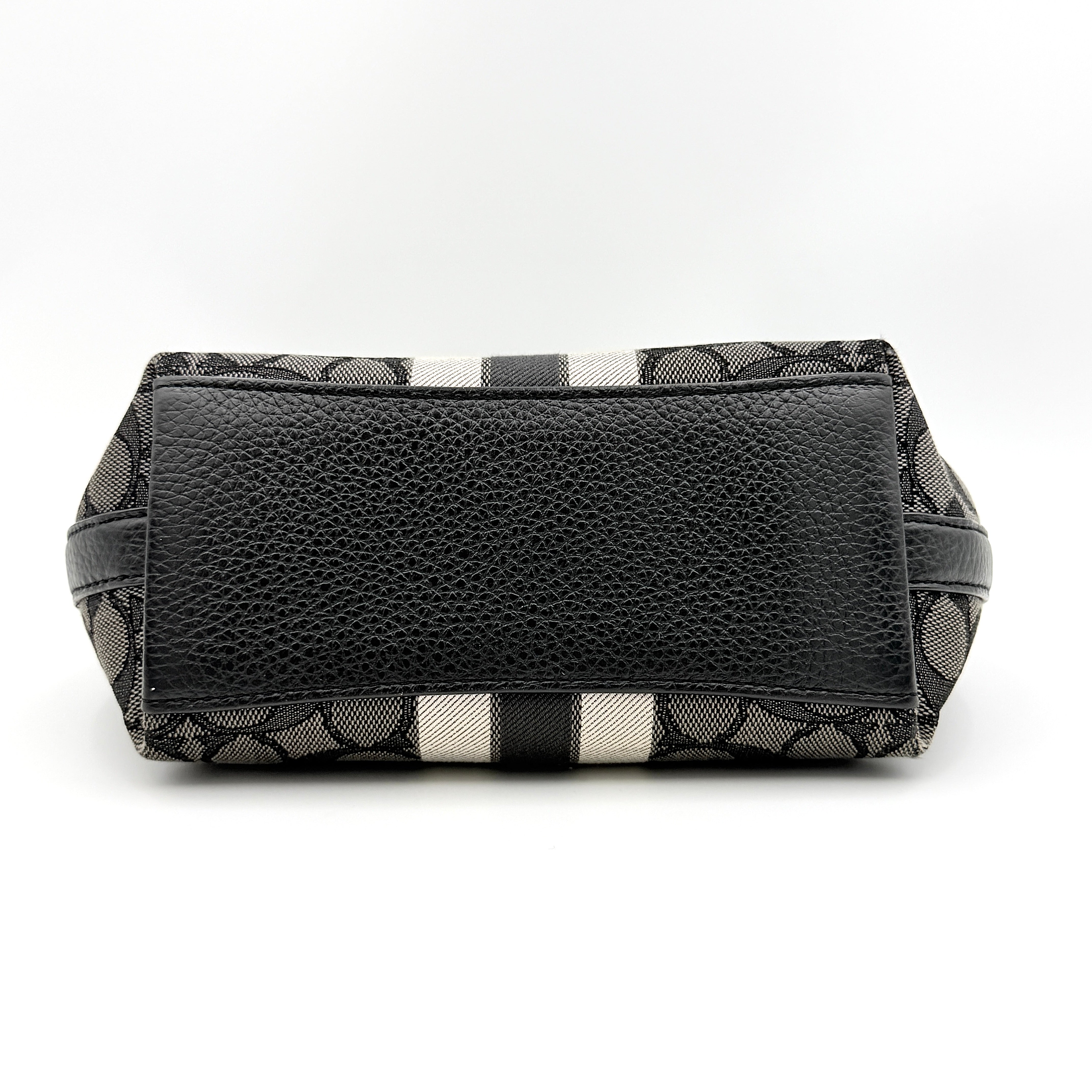 The Coach 2Way Signature Dempsey Stripe Shoulder Bag in black and grey canvas with detachable straps, shown flat on a white background.
