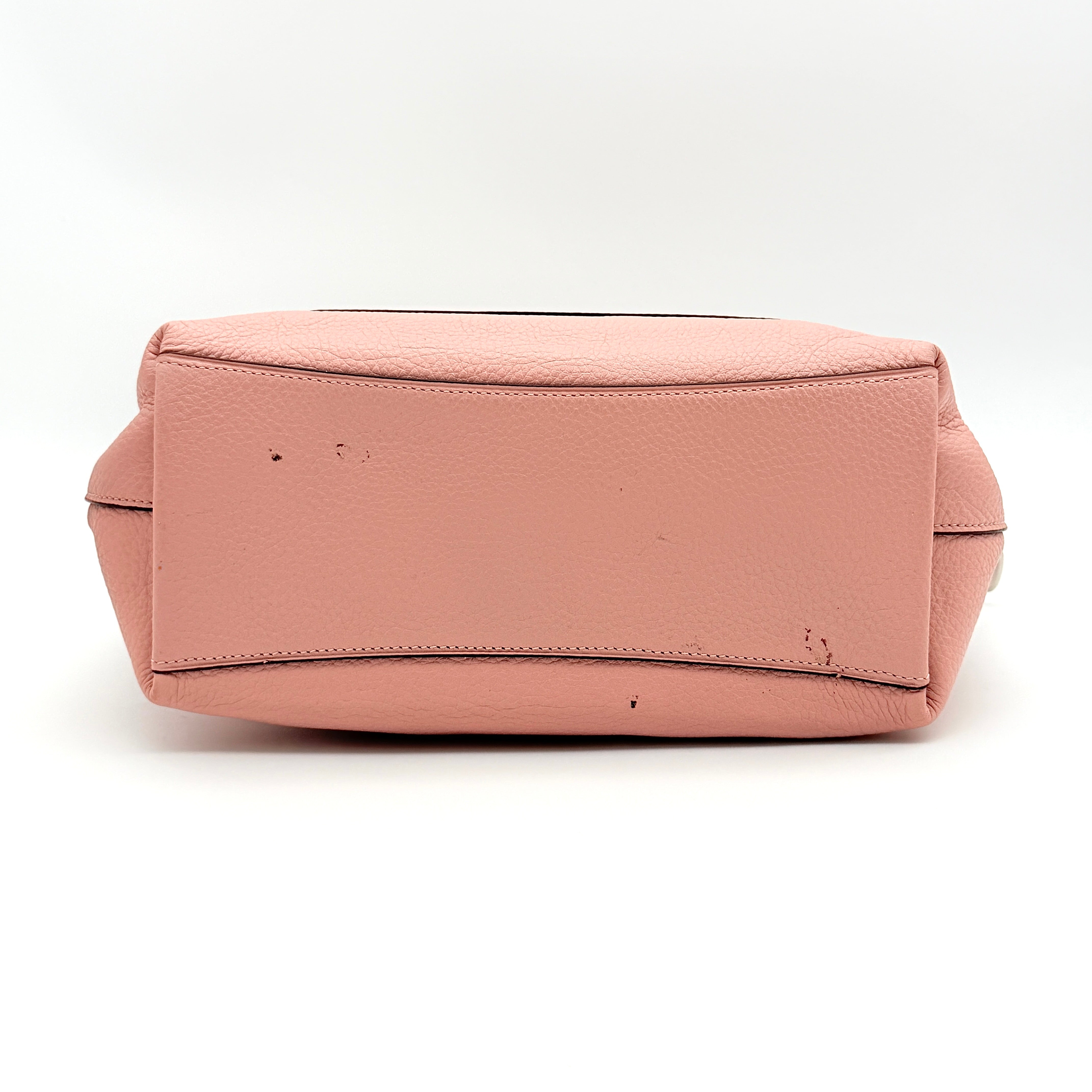Coach Mini Emma Satchel in pink pebbled leather with silver-tone hardware, shown with detachable strap.
