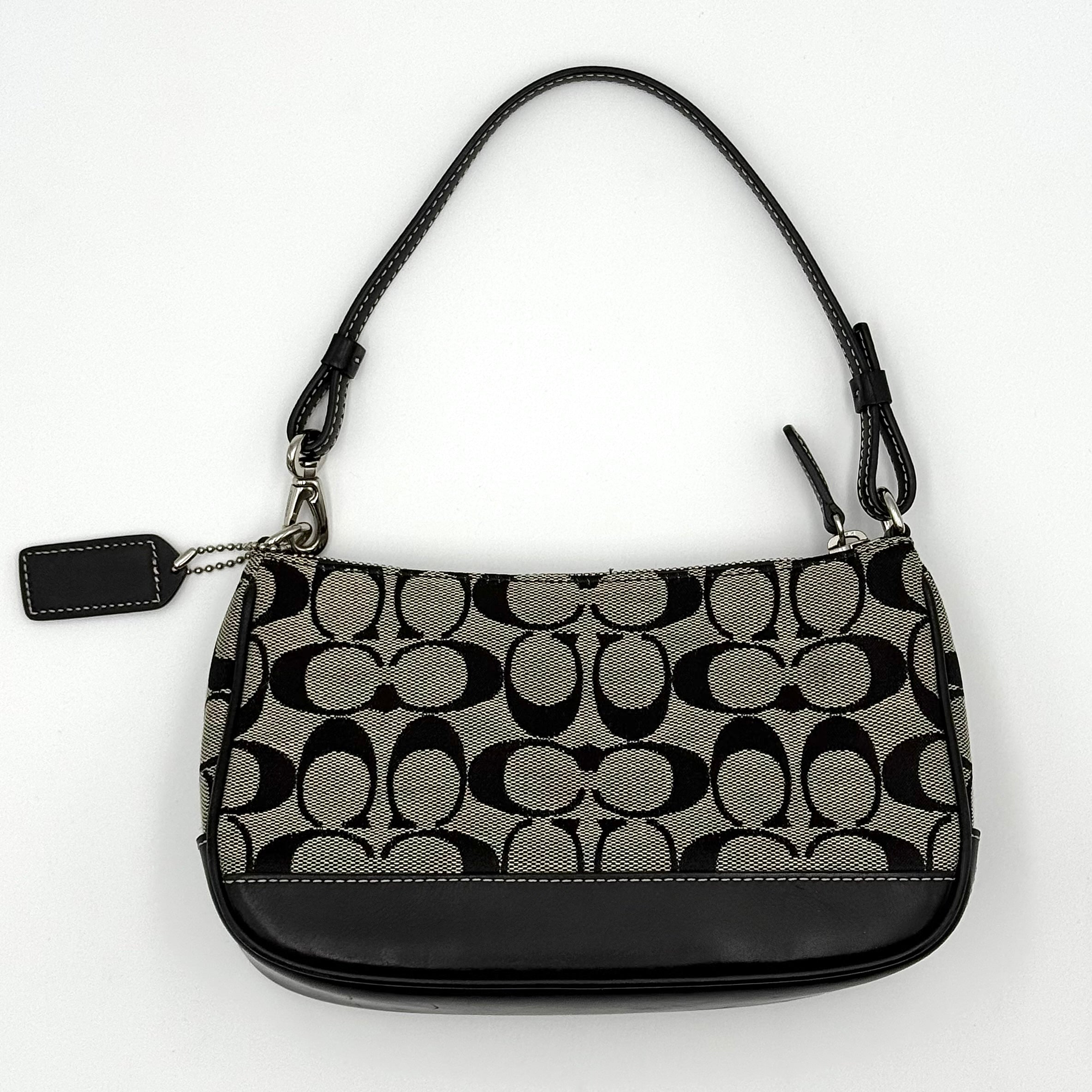 Coach Y2K Demi Shoulder Bag in black and grey signature jacquard with black leather trim and detachable Coach tag.