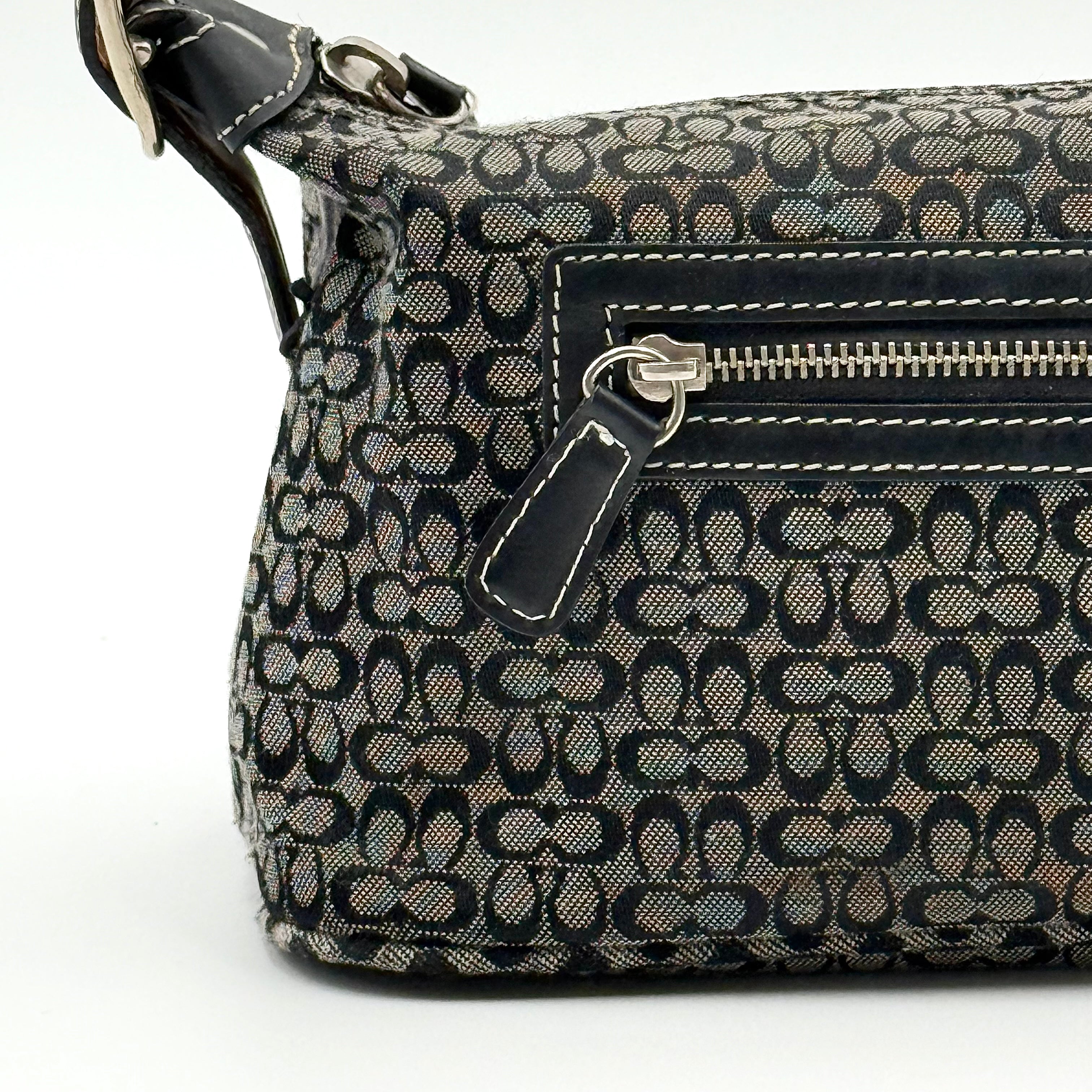 Coach Signature Hobo Shoulder Bag in grey and black canvas with leather trim and silver hardware, shown with monogram detail.