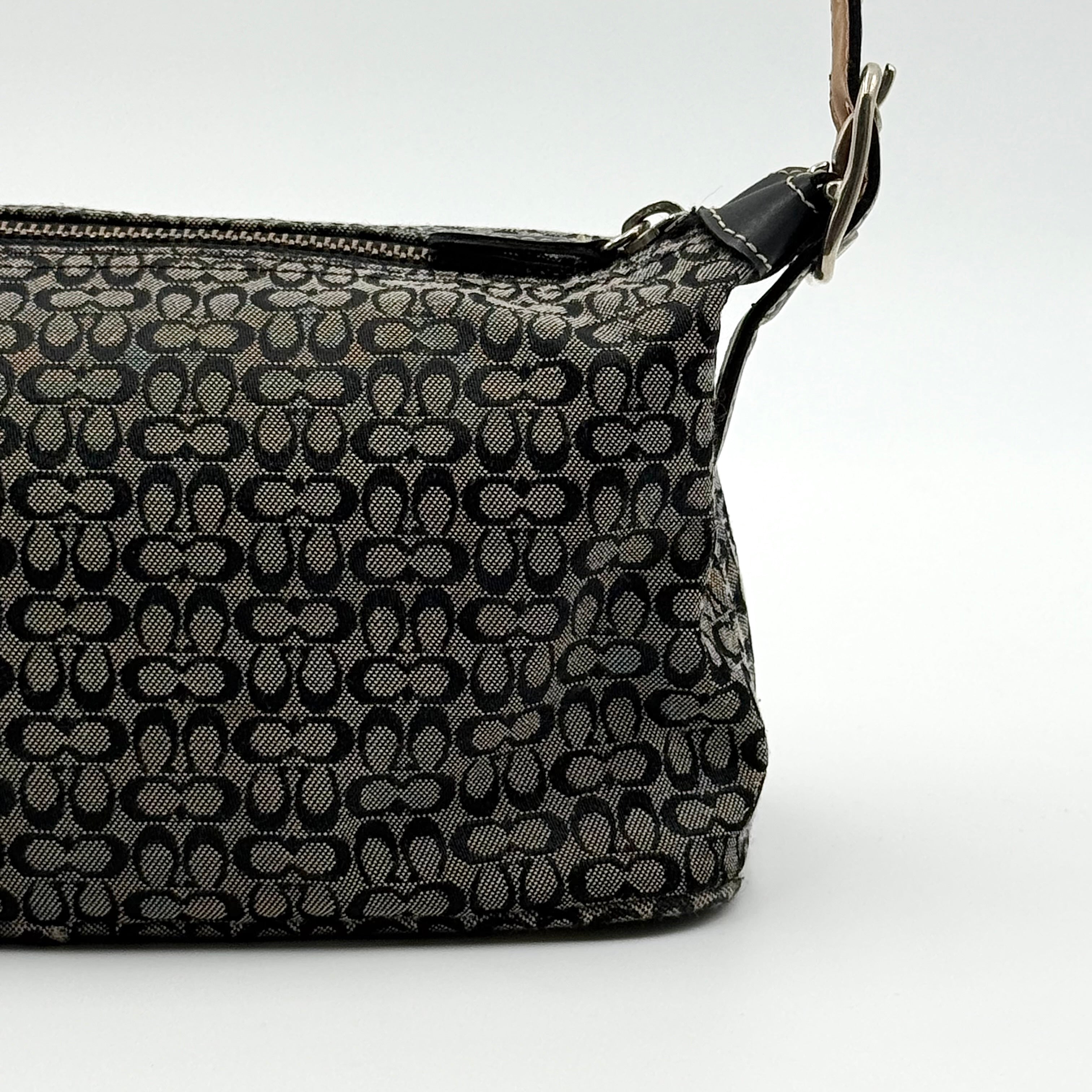 Coach Signature Hobo Shoulder Bag in grey and black canvas with leather trim and silver hardware, shown with monogram detail.