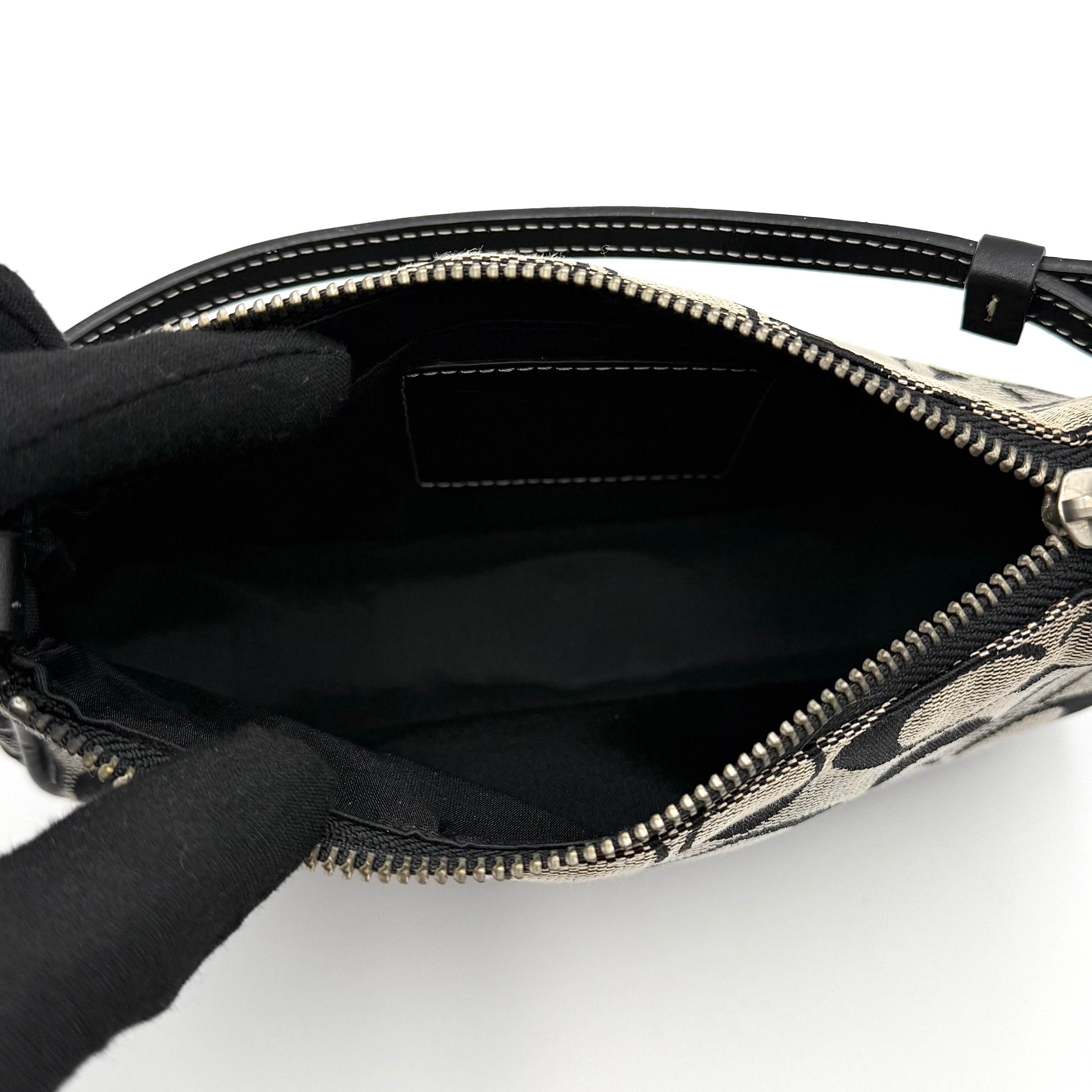 Coach Y2K Demi Shoulder Bag in black and grey signature jacquard with black leather trim and silver hardware.