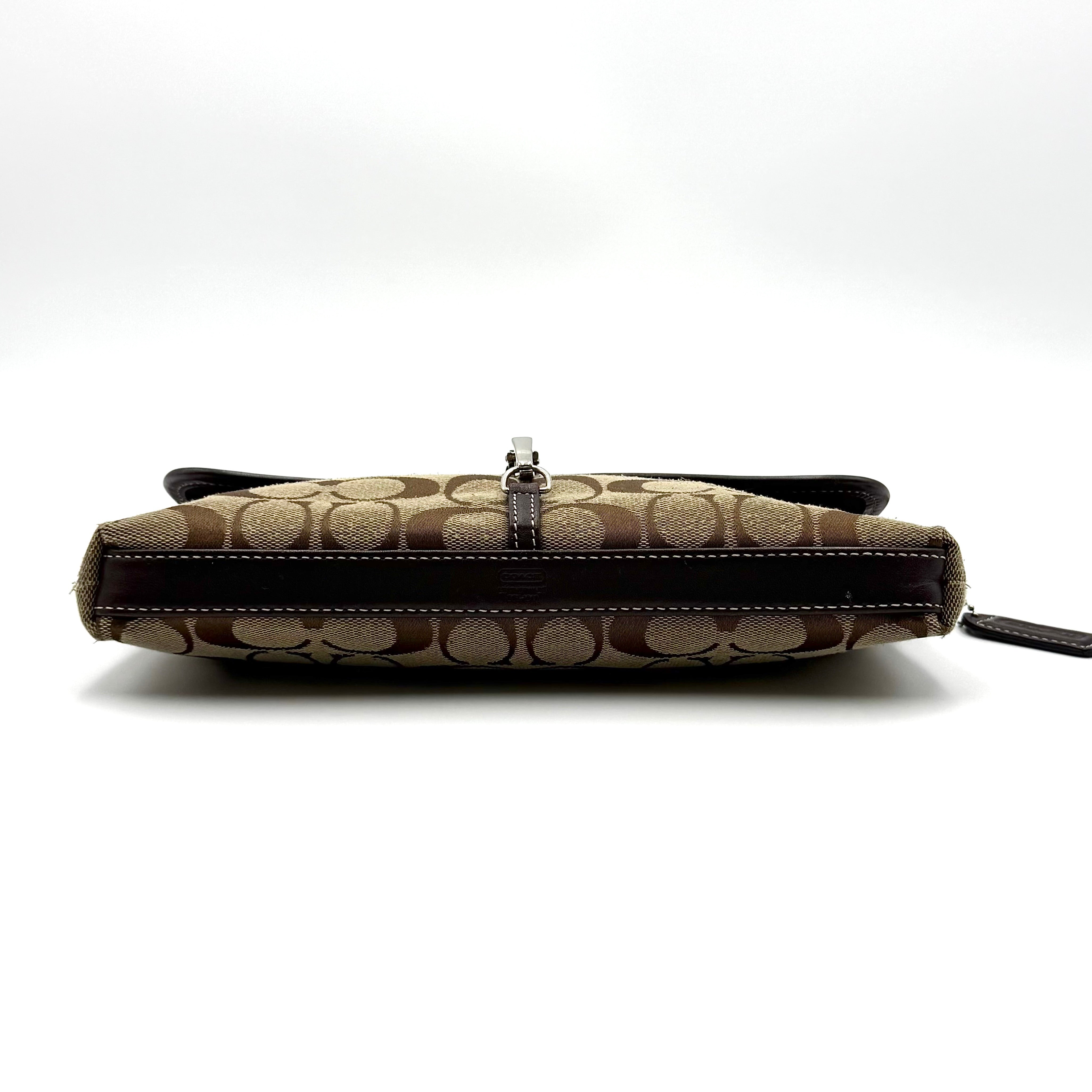 Coach Y2K Demi Clip Baguette in beige and brown canvas with leather trim, featuring signature monogram and shoulder strap.