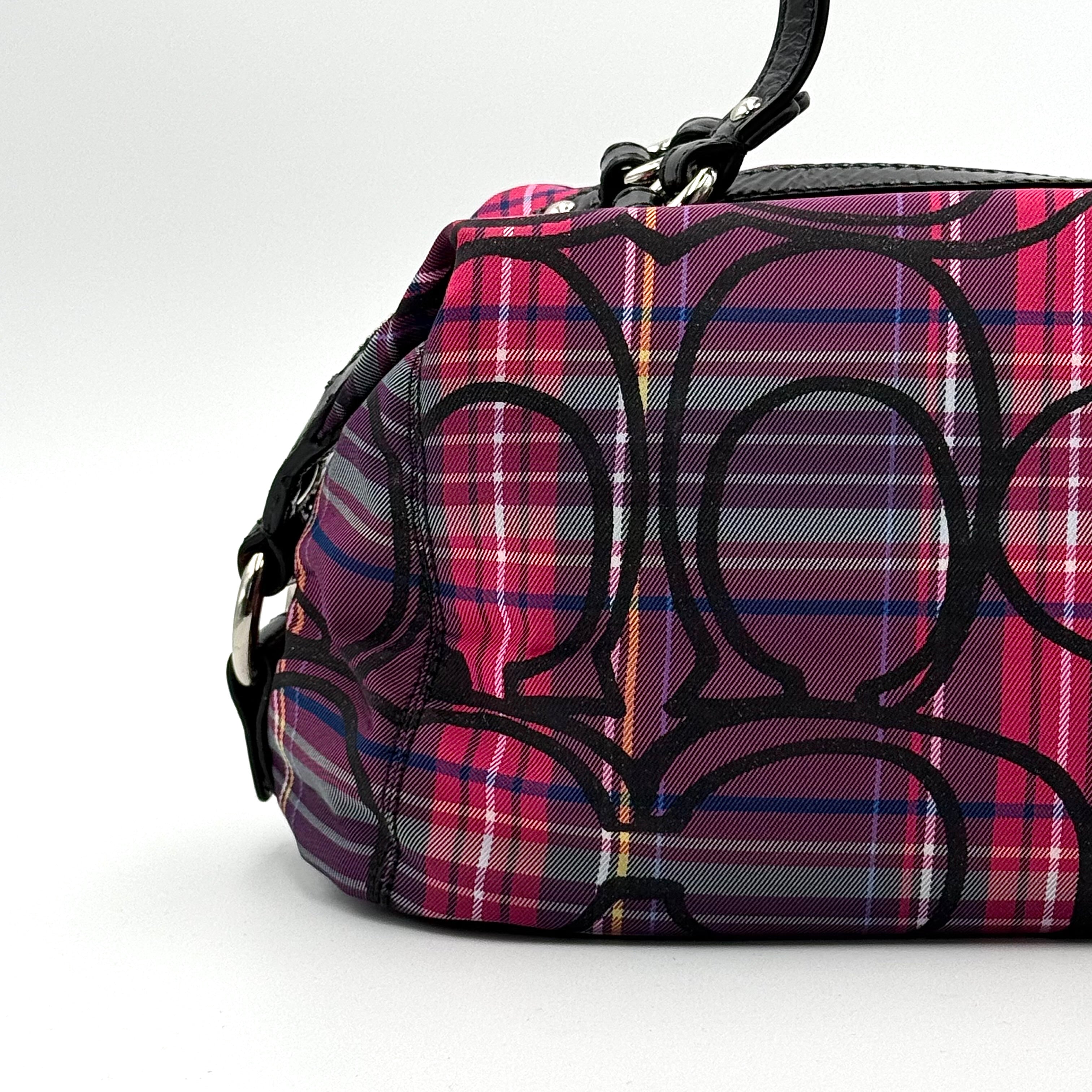 Coach Signature Poppy Tartan Shoulder Bag in vibrant multi plaid with bold black logo print, featuring black patent trim and silver hardware.