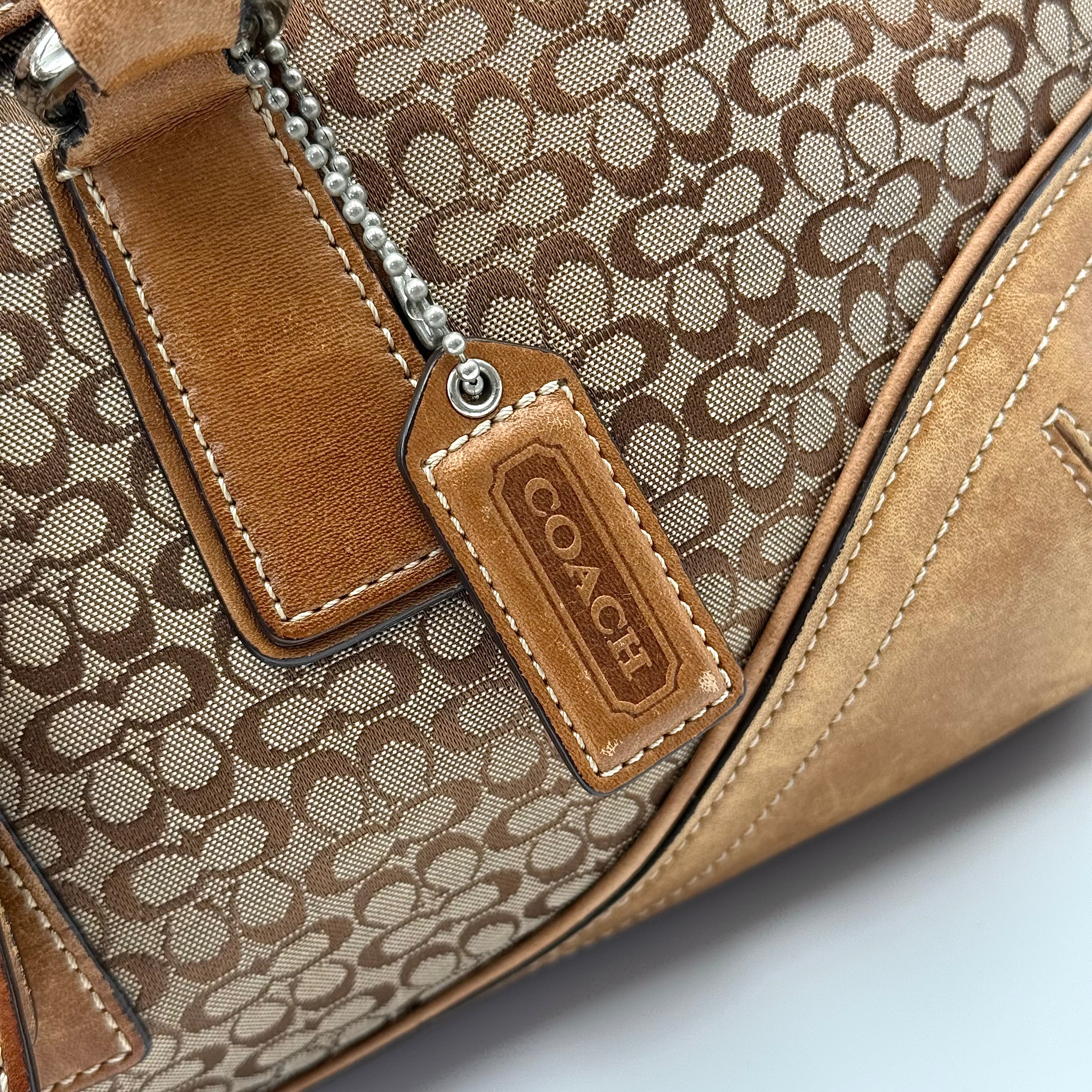 Front-facing view of the Coach Y2K Signature Soho Shoulder Bag in beige and tan jacquard with leather trim.