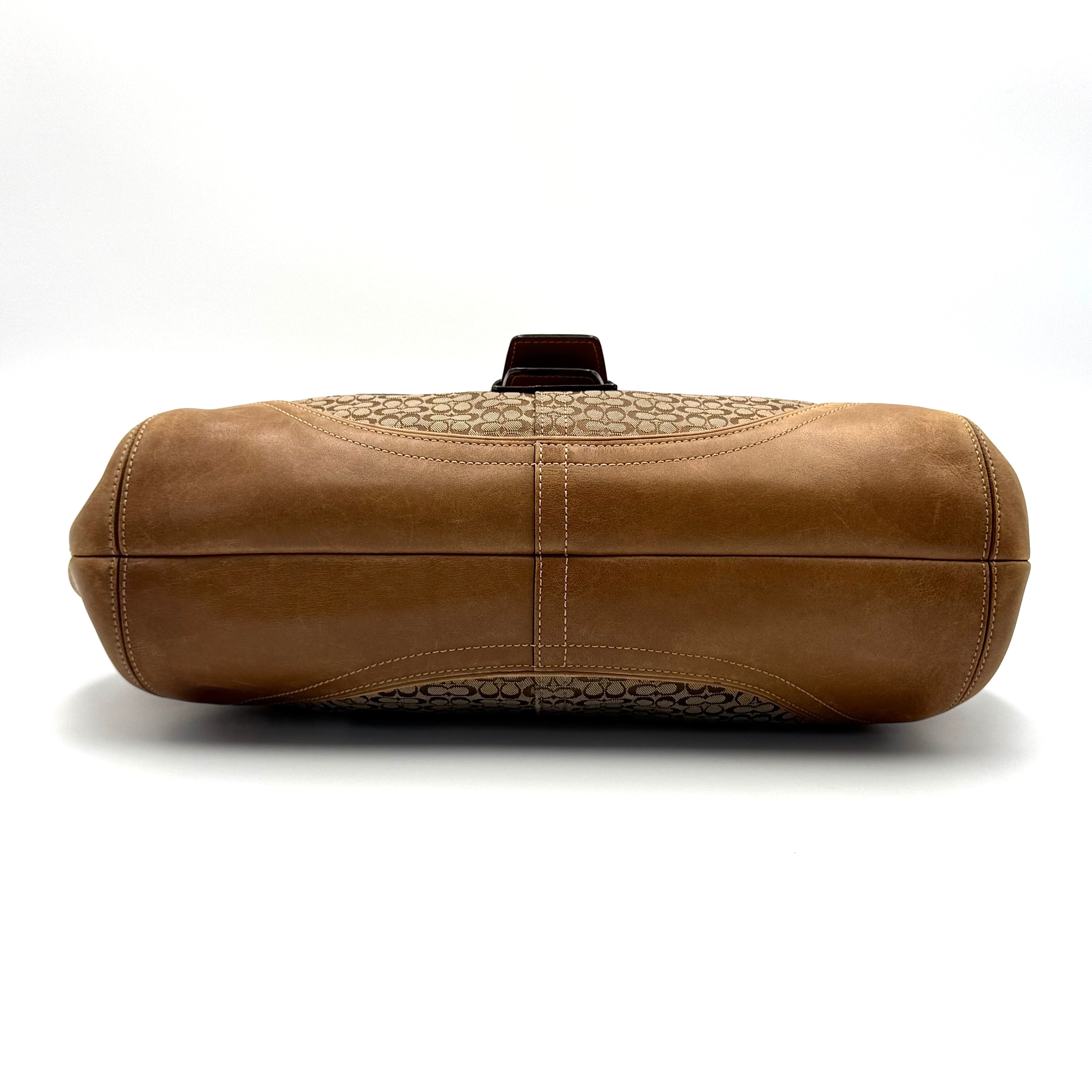 Front-facing view of the Coach Y2K Signature Soho Shoulder Bag in beige and tan jacquard with leather trim.