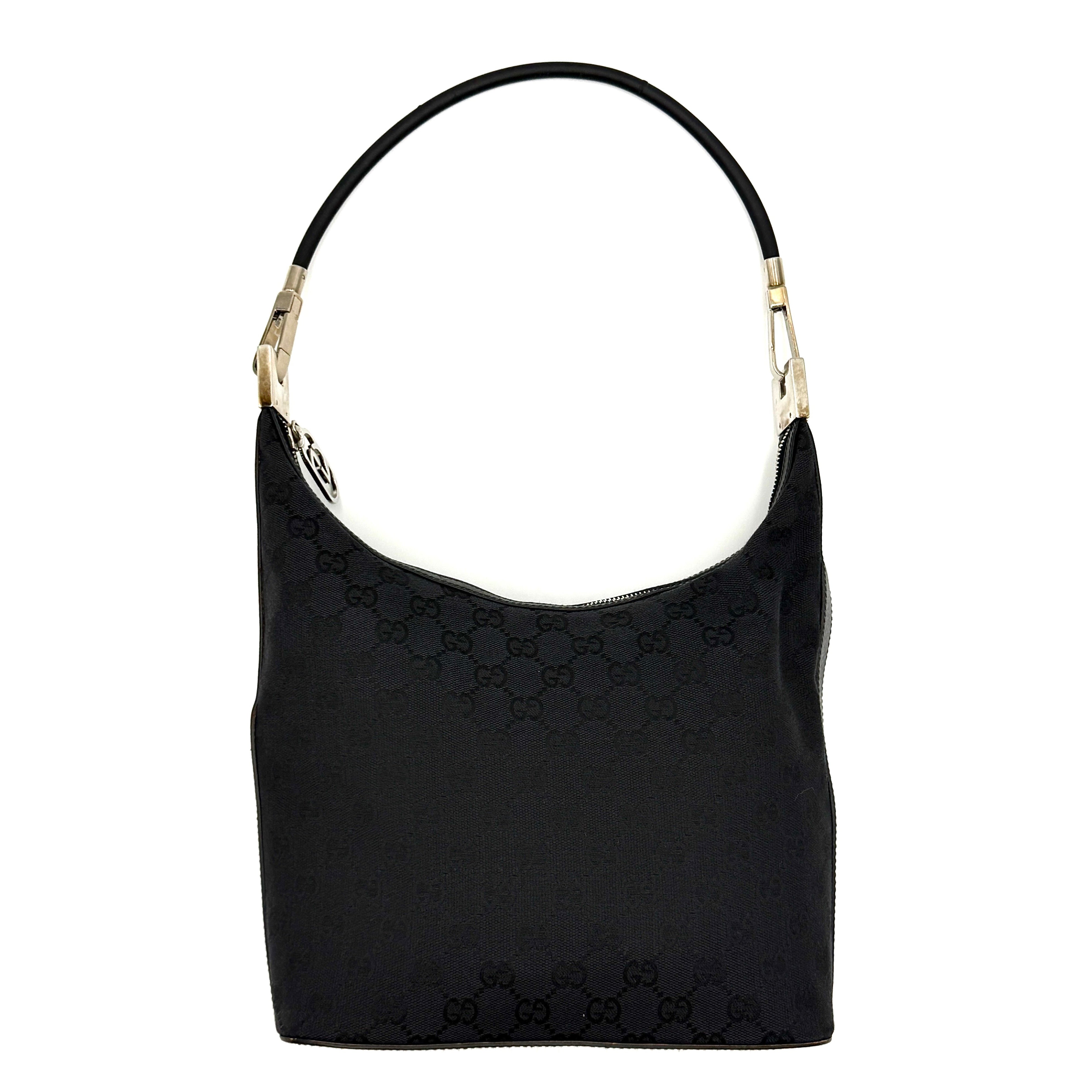 Gucci GG Monogram Hobo Shoulder Bag in black canvas with tonal GG logo pattern, silver-tone hardware and a single top handle.