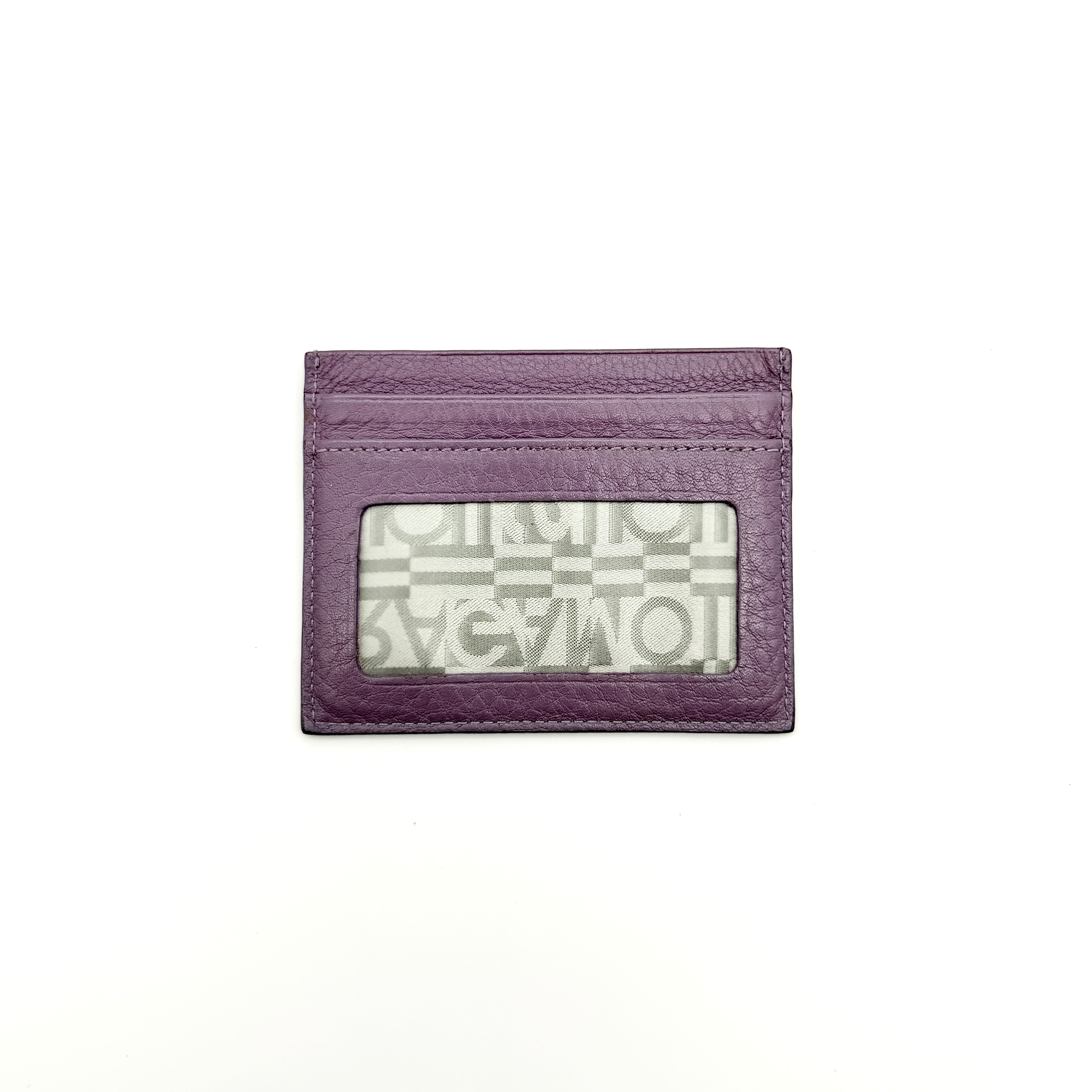 Salvatore Ferragamo purple grained leather card holder with card slots and subtle logo detailing.