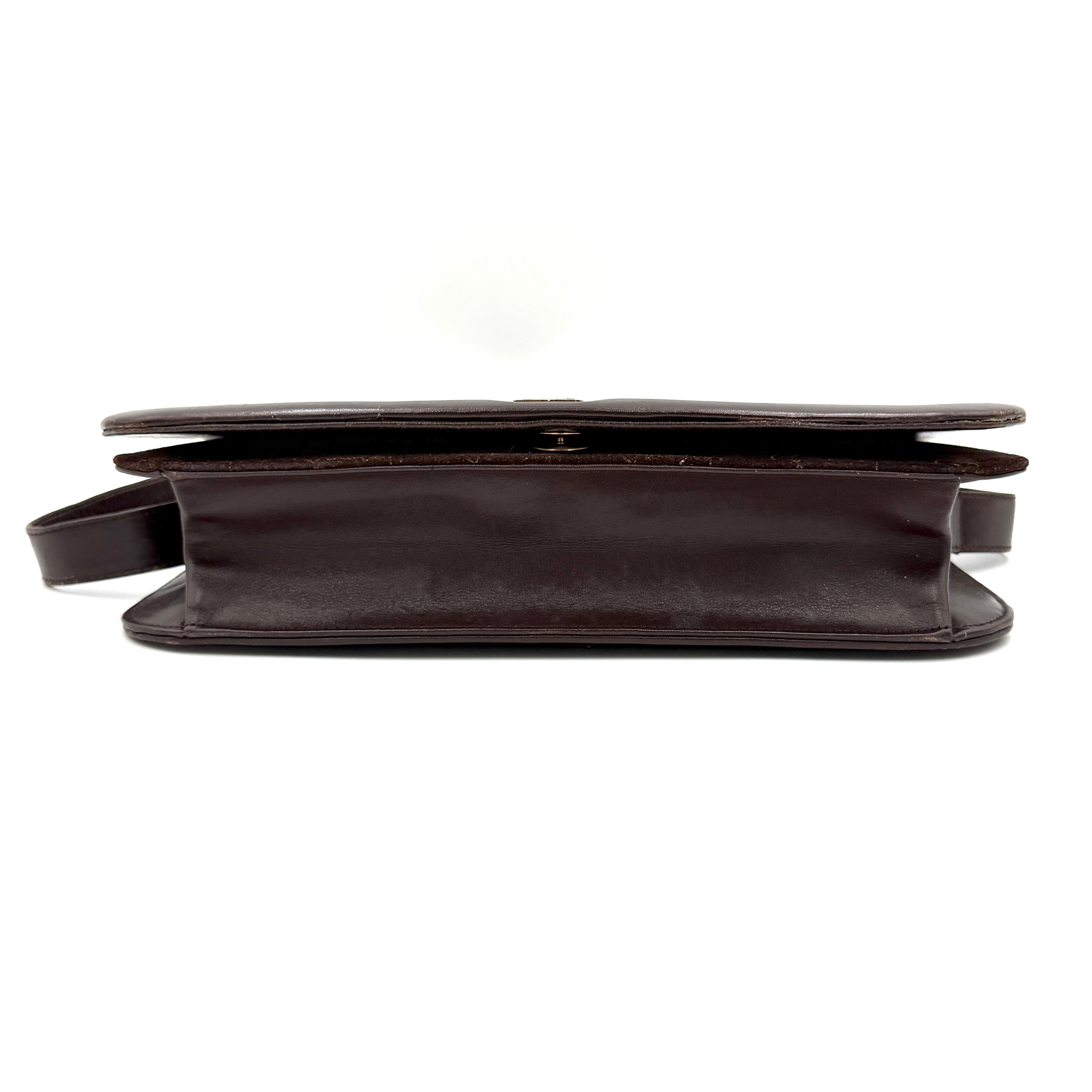 Givenchy 4G Monogram brown suede shoulder bag with leather trim and silver-tone clasp, photographed on a white background.